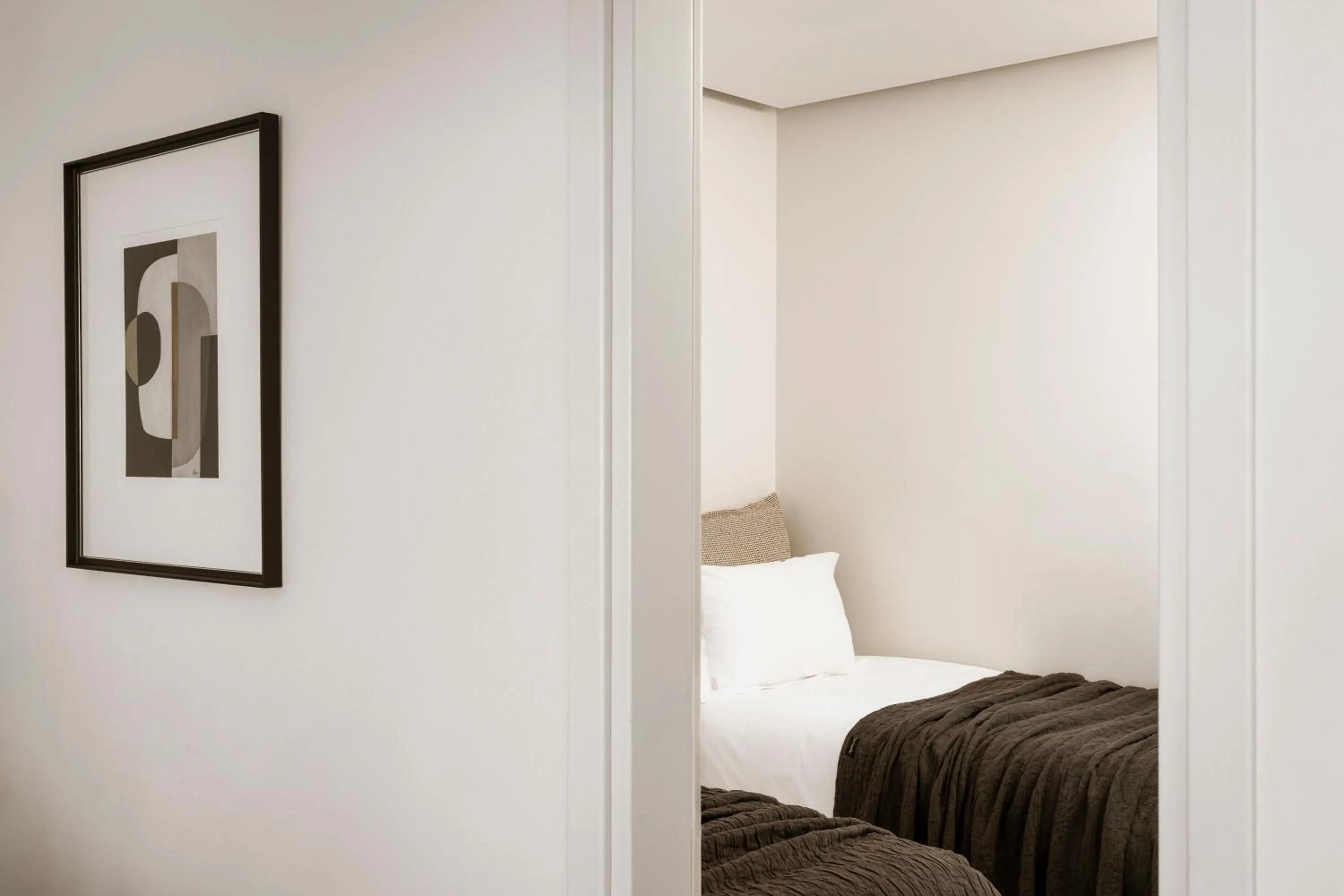 Bedroom, Bed in NĒRO Suites by NOMÉE Hospitality Group