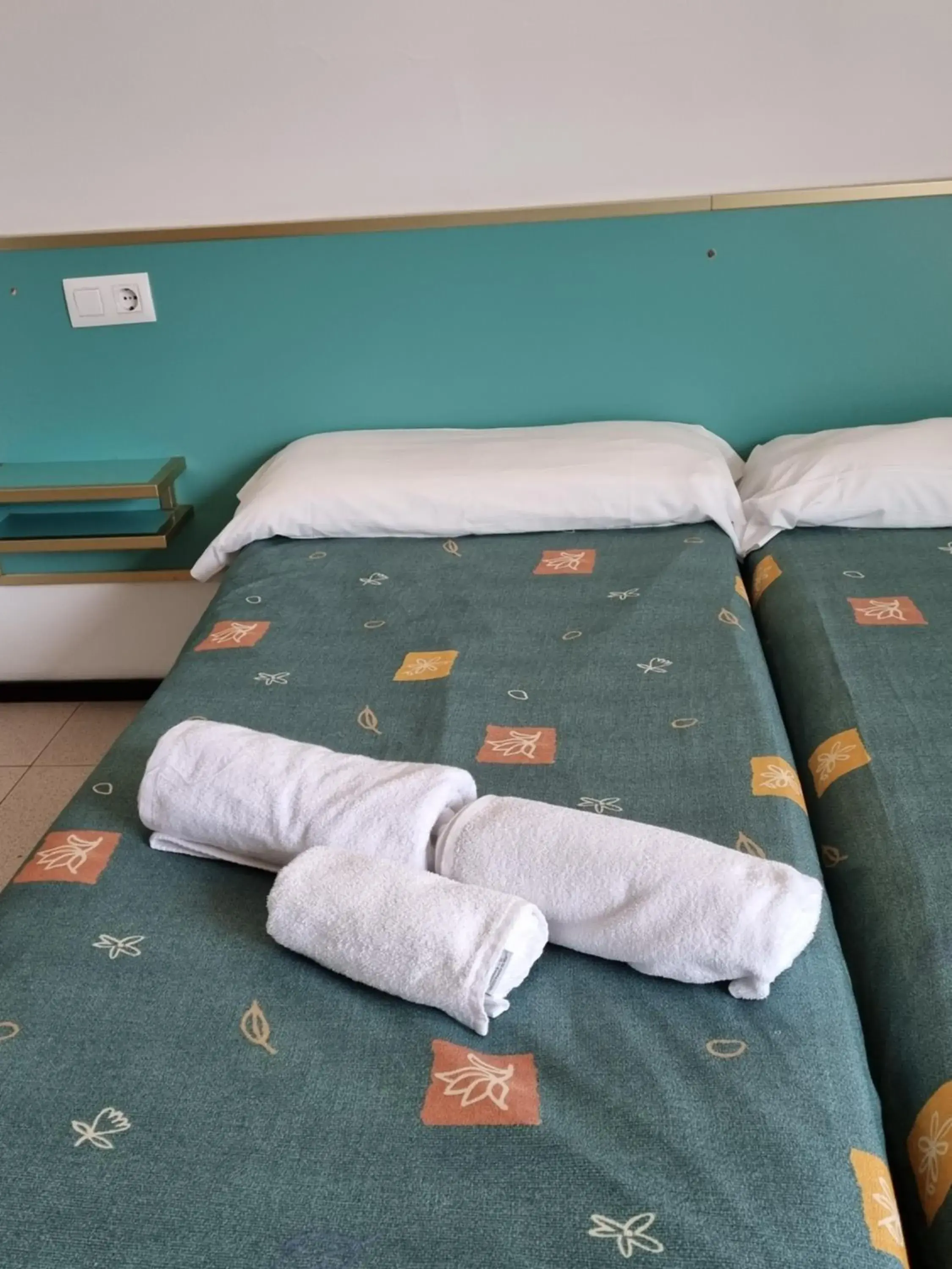 Property building, Bed in Apartments Lloret Sun Property building, Bed in Apartments Lloret Sun