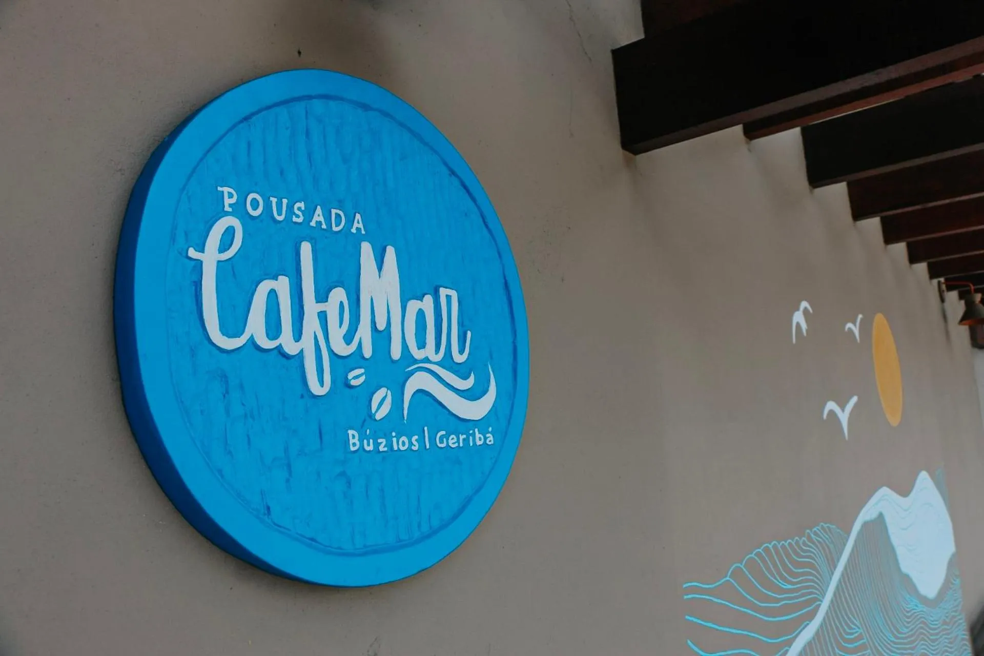 Property logo or sign in Pousada CafeMar Búzios