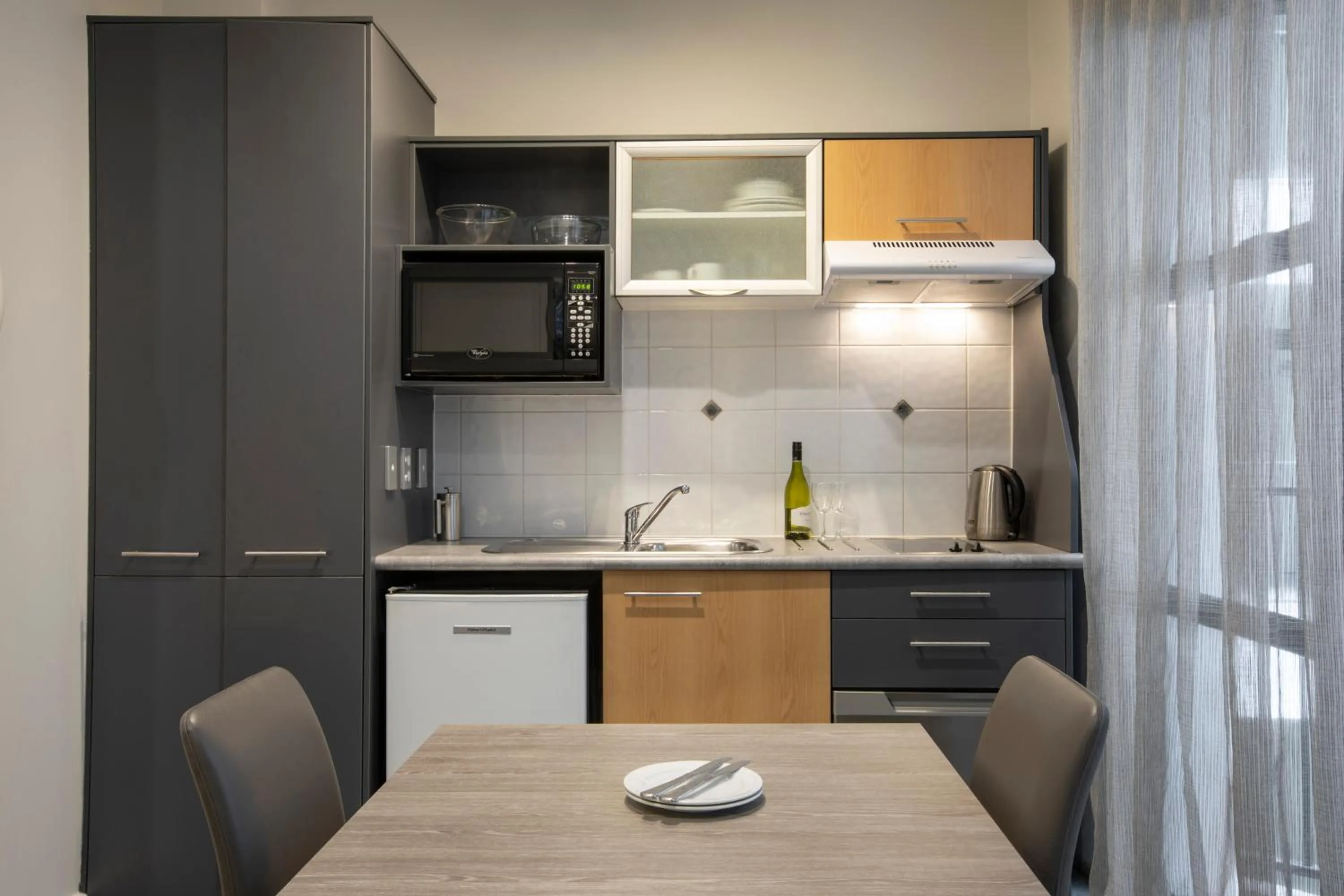 Kitchen or kitchenette in Quest Atrium Apartment Hotel