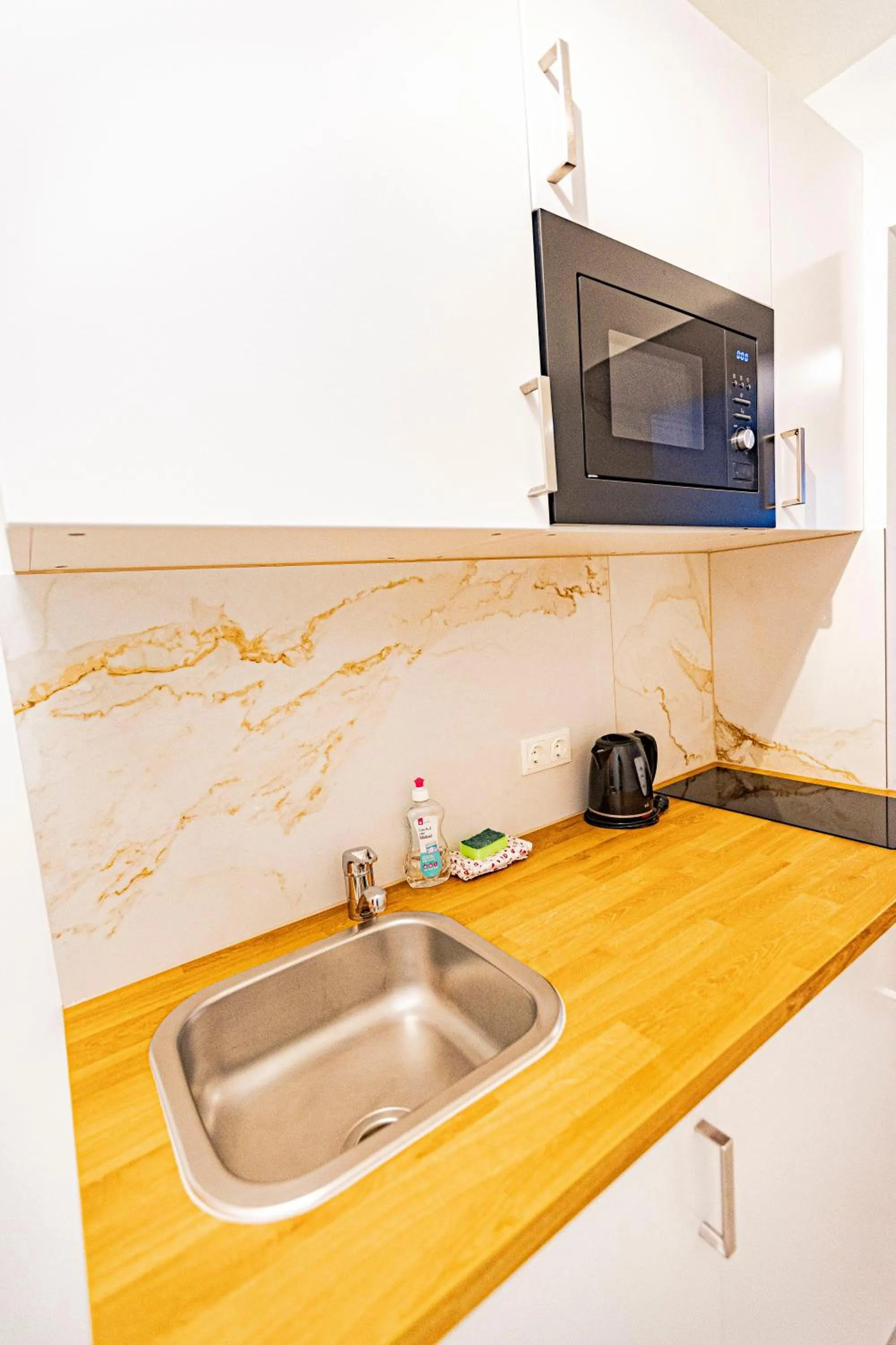 Kitchen or kitchenette in Hotel Klimt