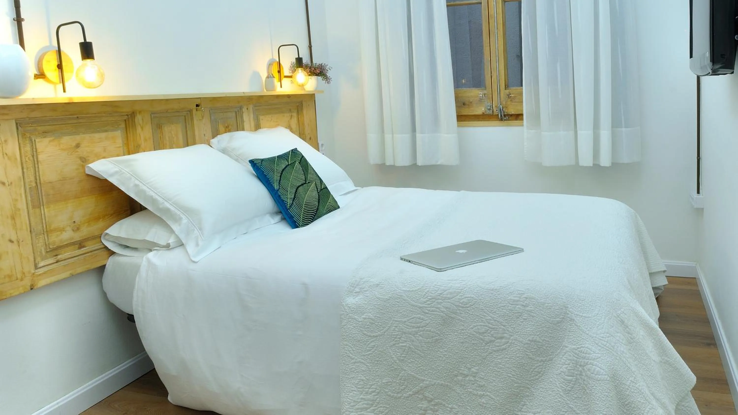 Bed in Hostal Girona