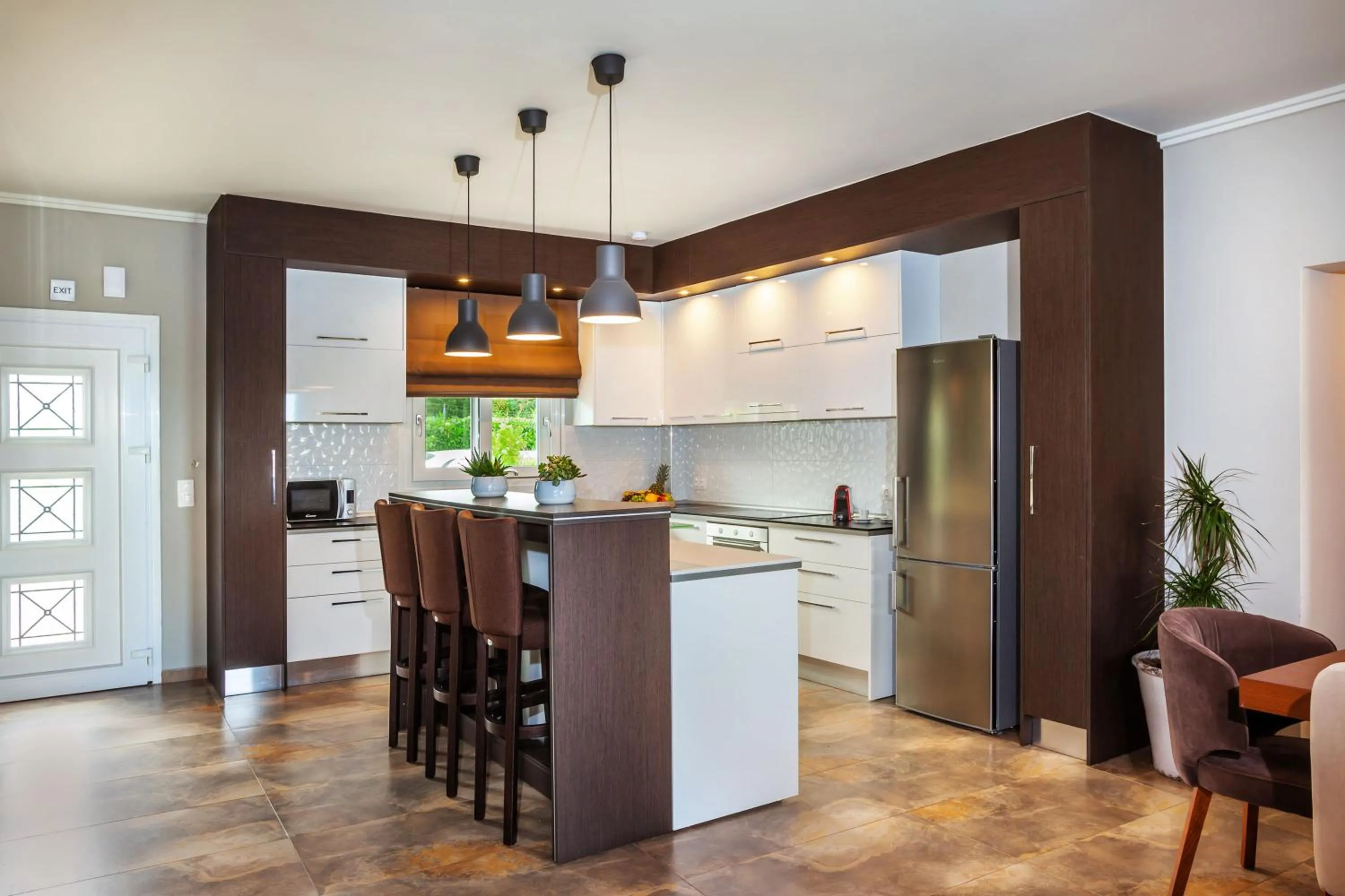 Kitchen or kitchenette in Sunny Villas Resort & Spa