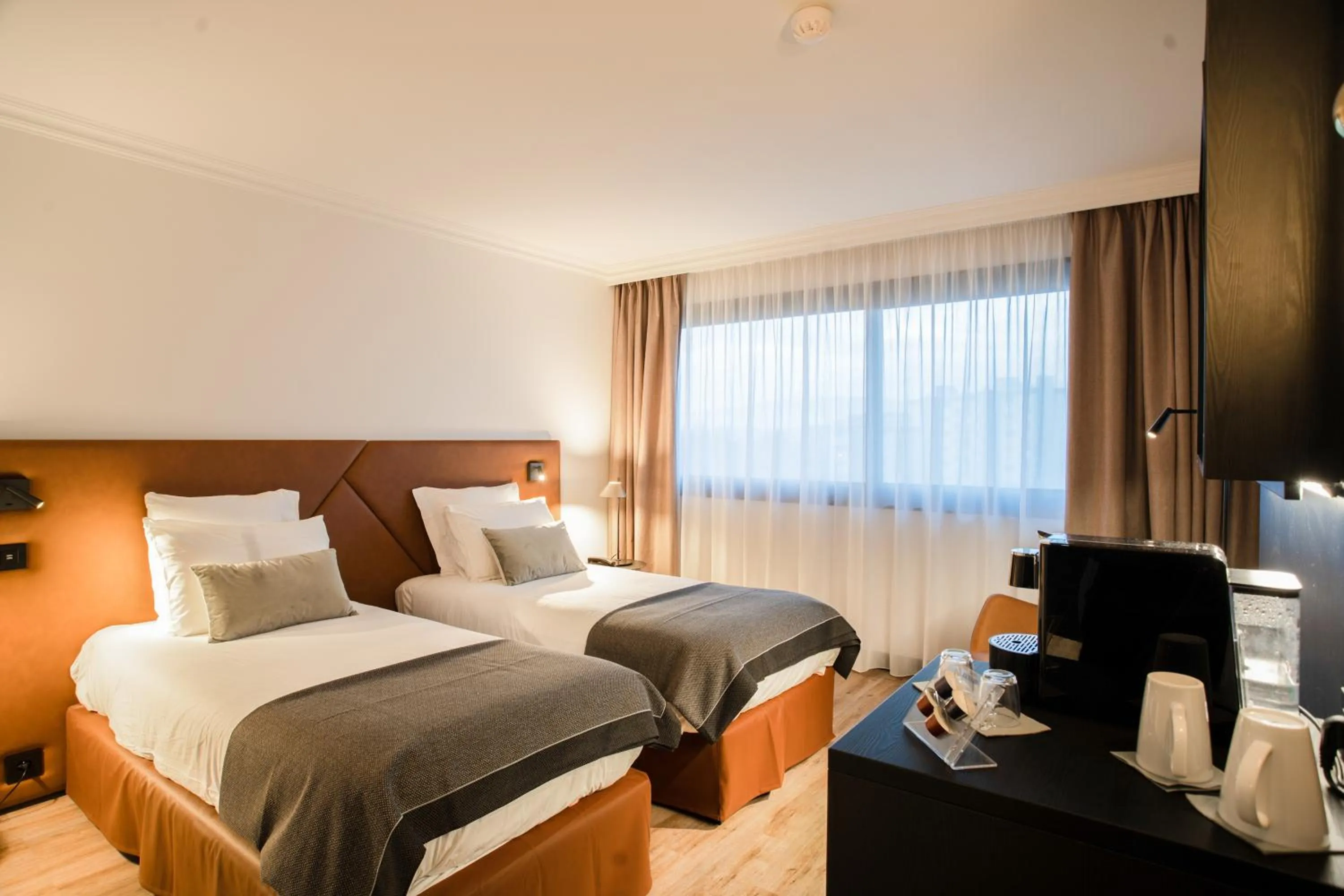 Bed in Appart'City Collection Genève Aéroport - Ferney Voltaire