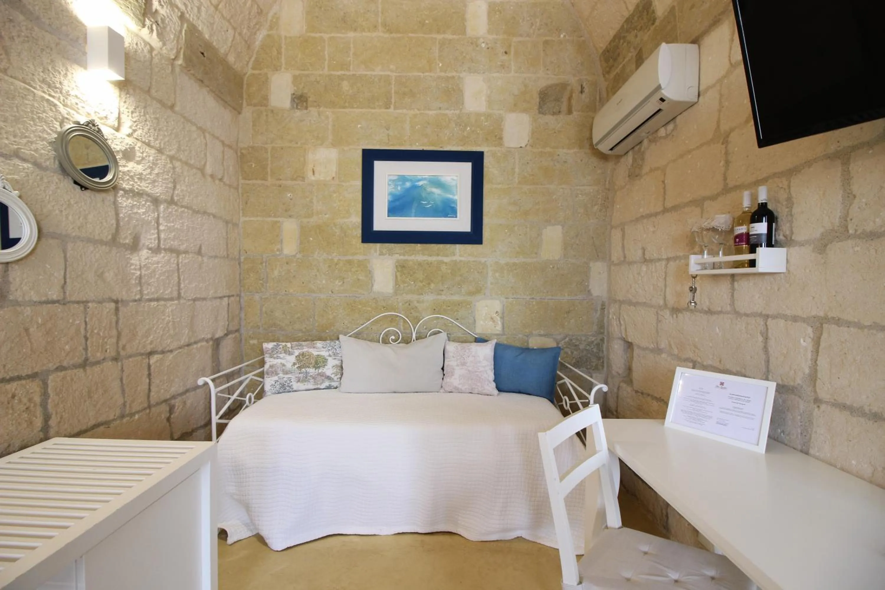 Bed in Don Agostino Relais Masseria