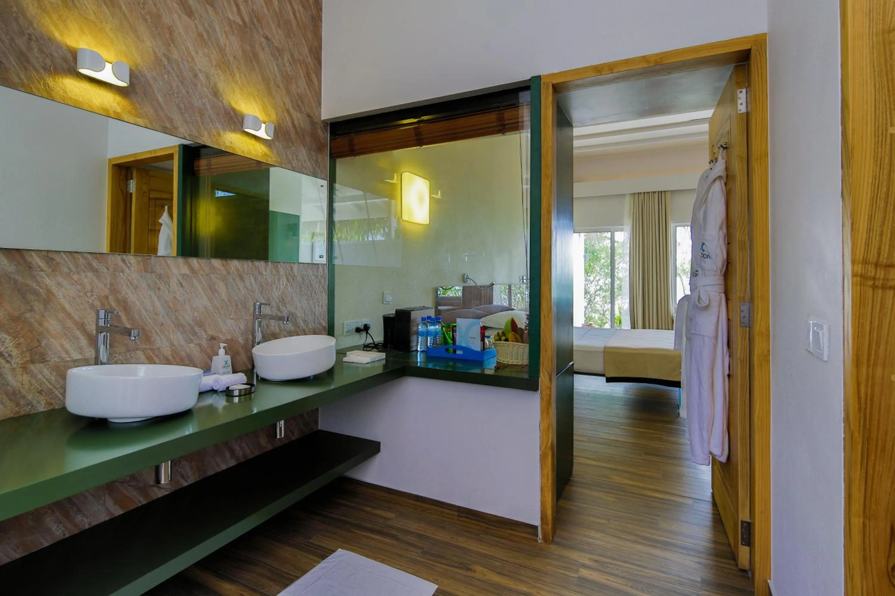 Bathroom, Bed in Cocoon Maldives - All Inclusive