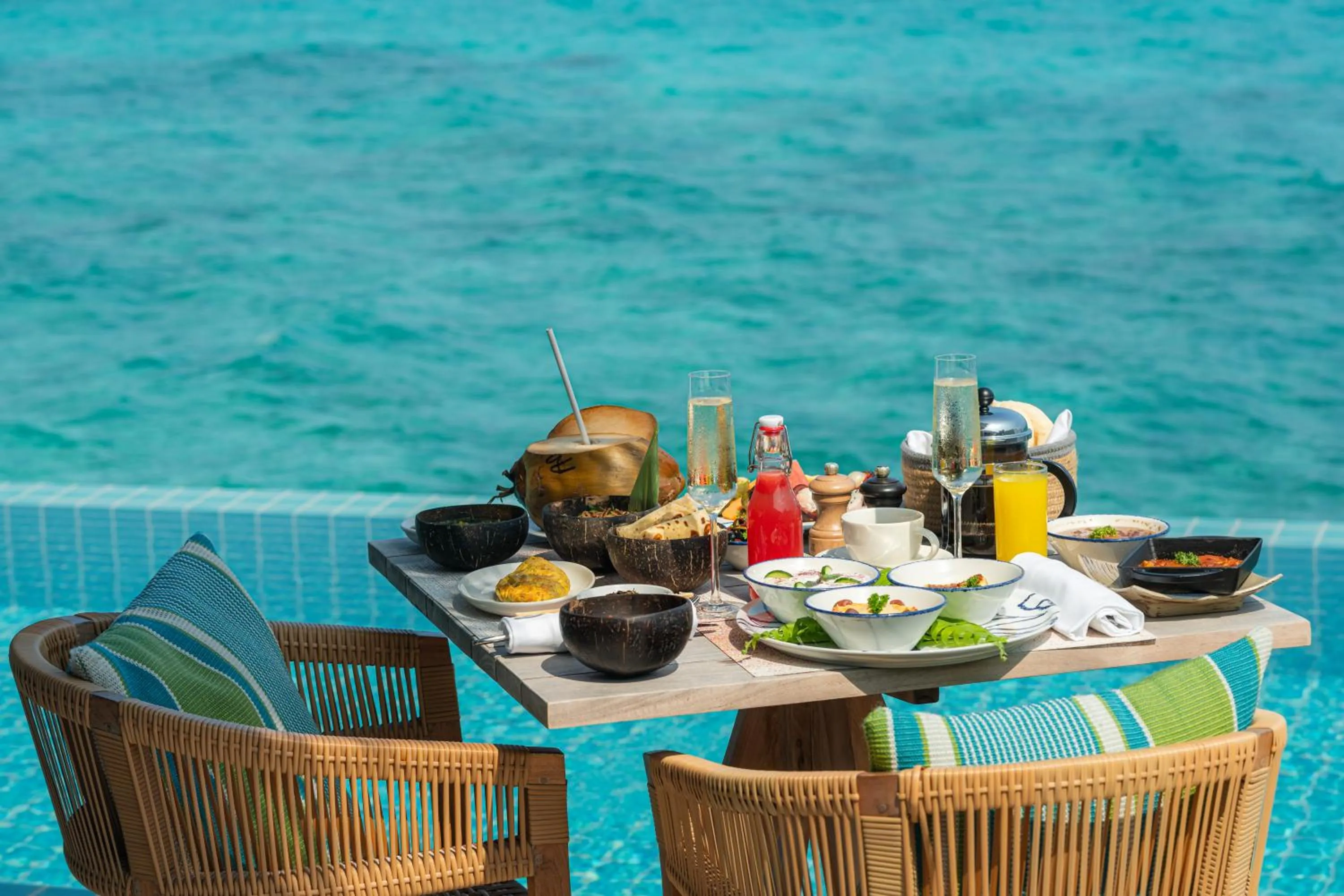room service in Finolhu, A Seaside Collection Resort, a Member of Design Hotels