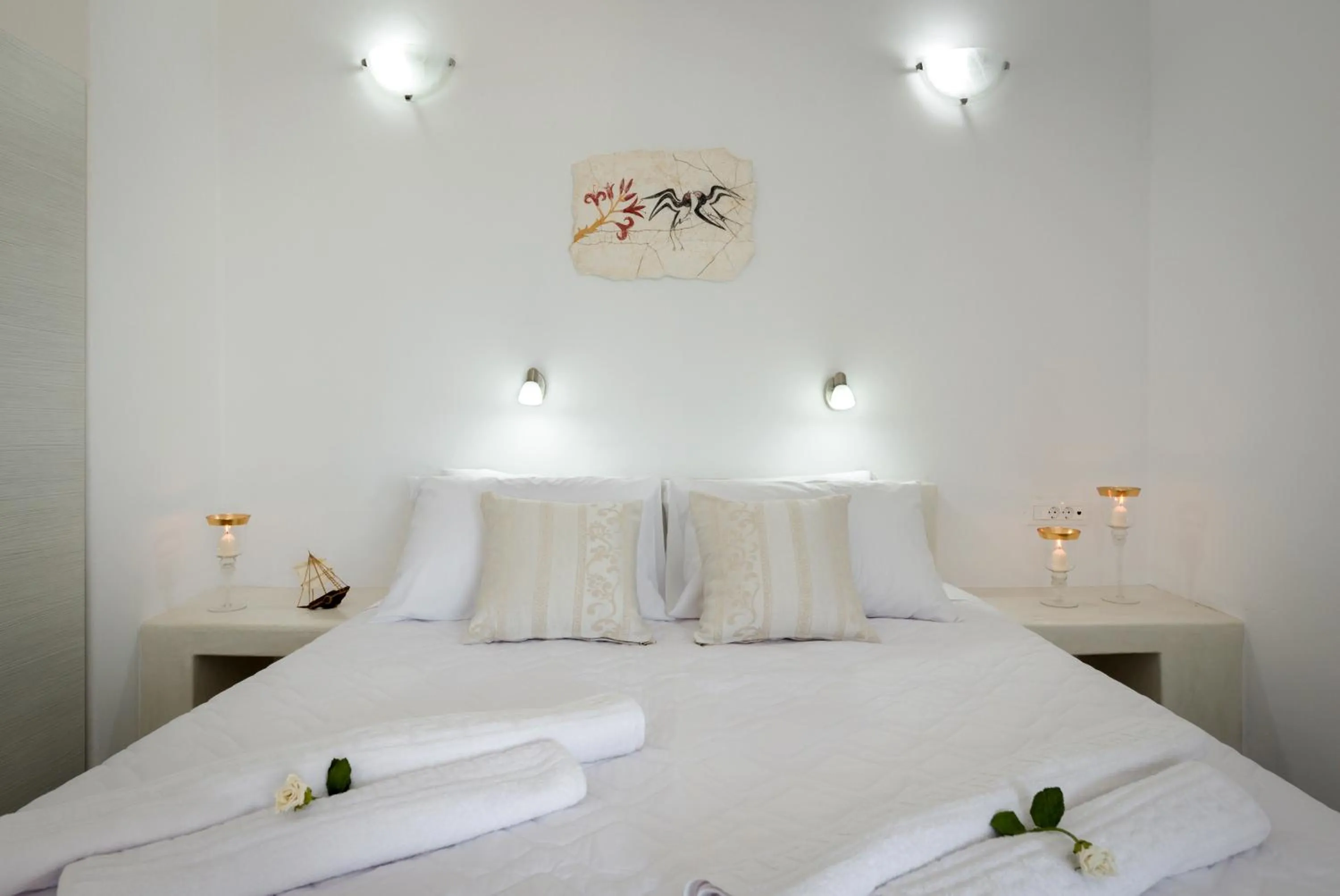 Bed in Pancratium Villas & Suites