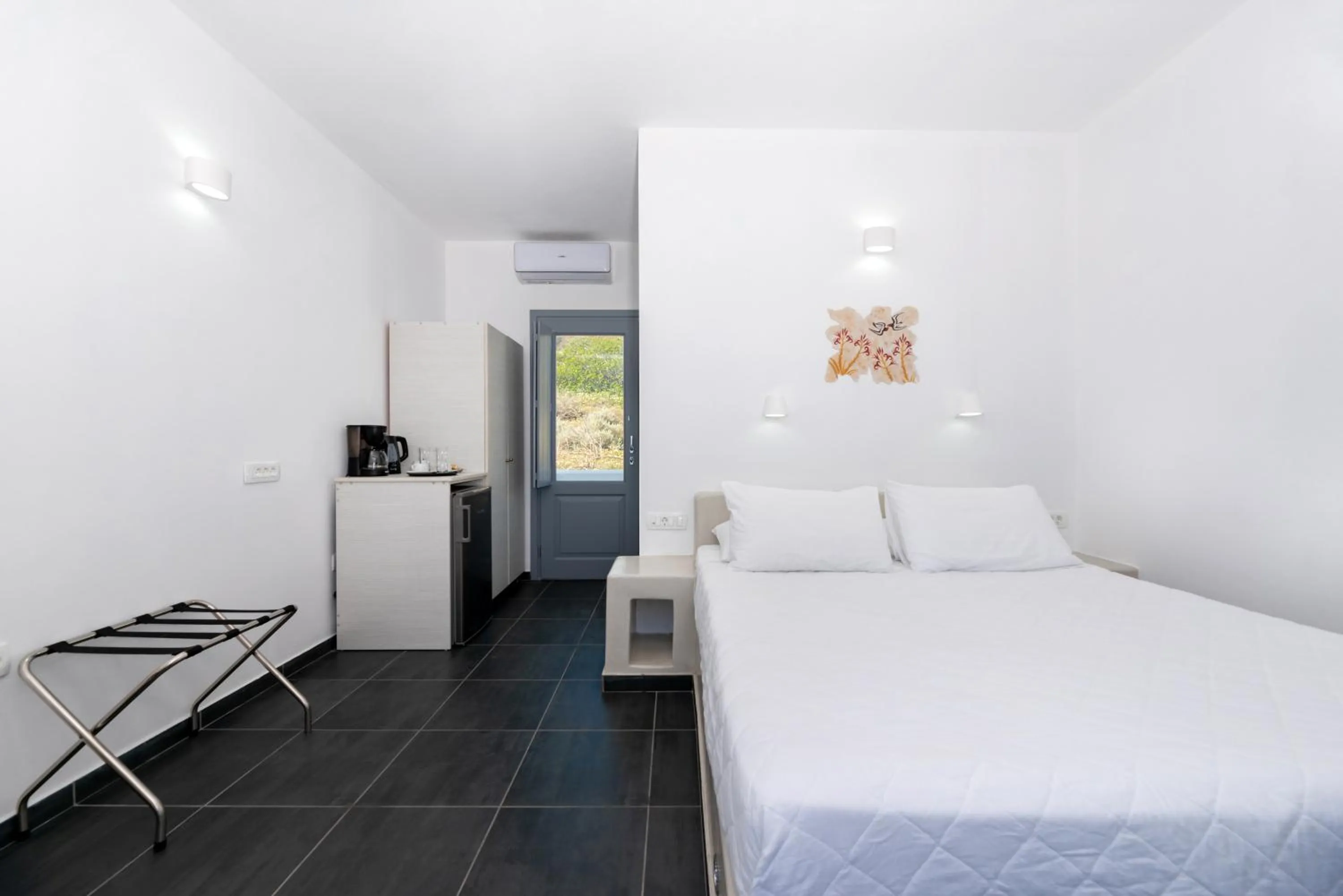 Bed in Pancratium Villas & Suites