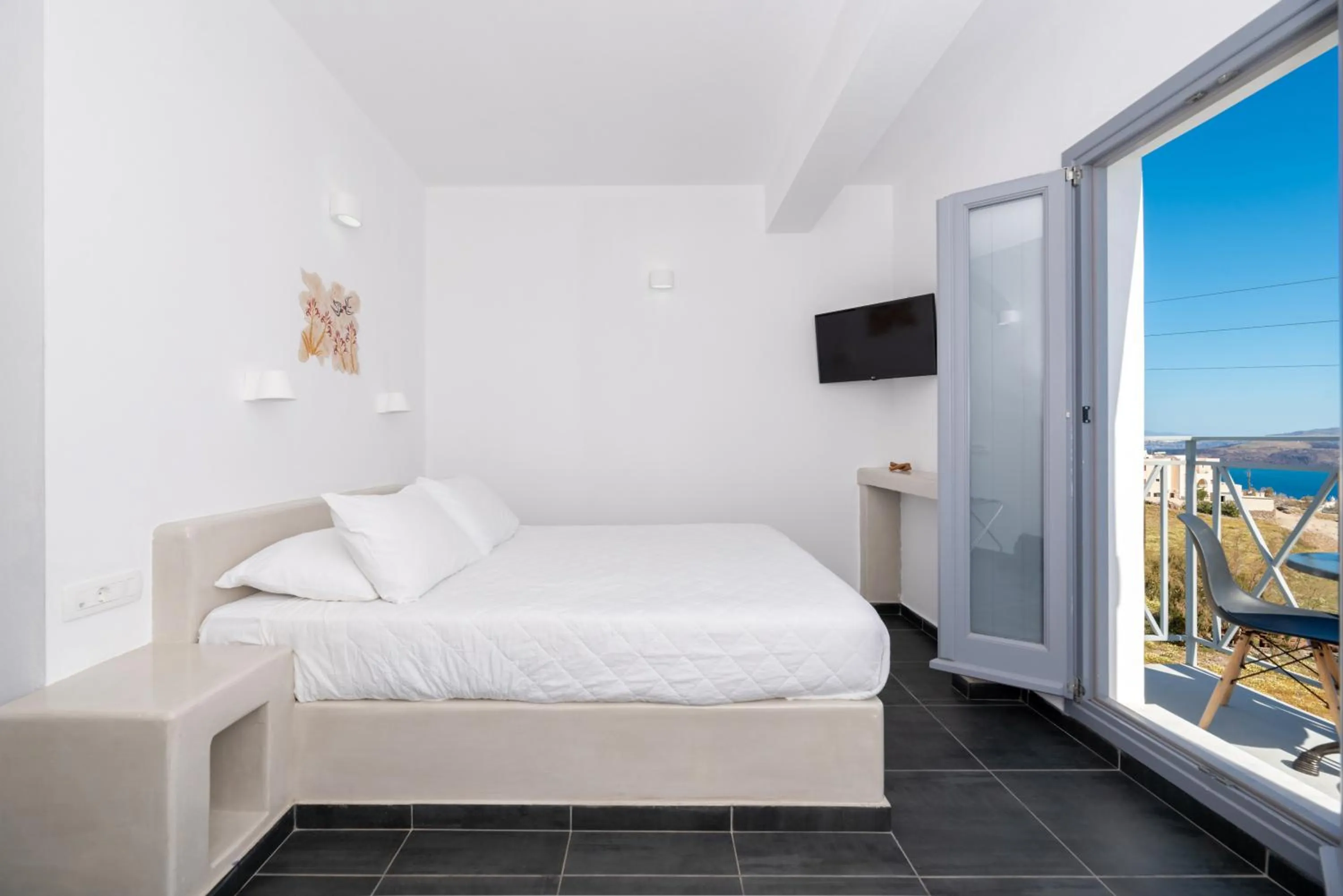 Bed in Pancratium Villas & Suites