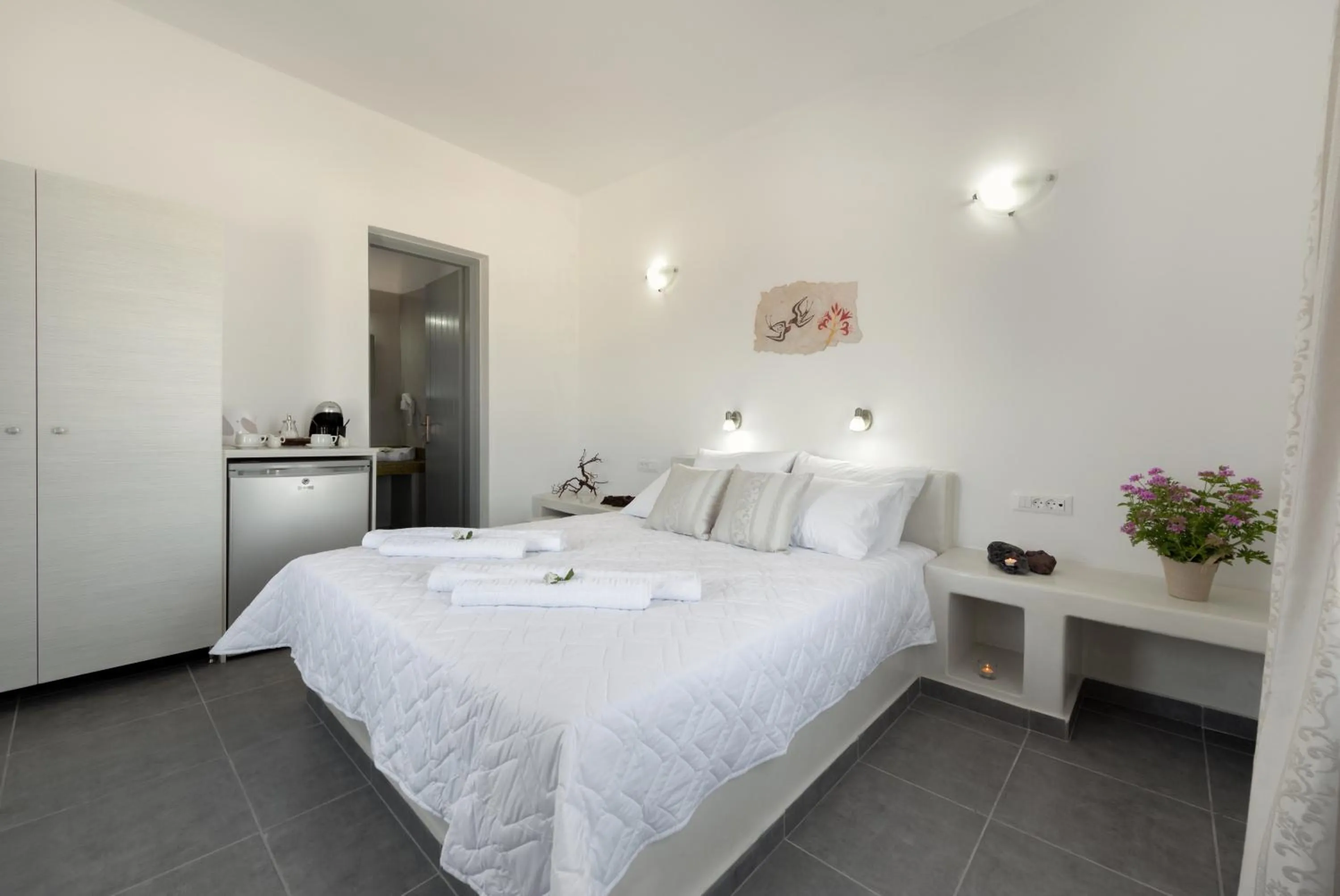 Bed in Pancratium Villas & Suites