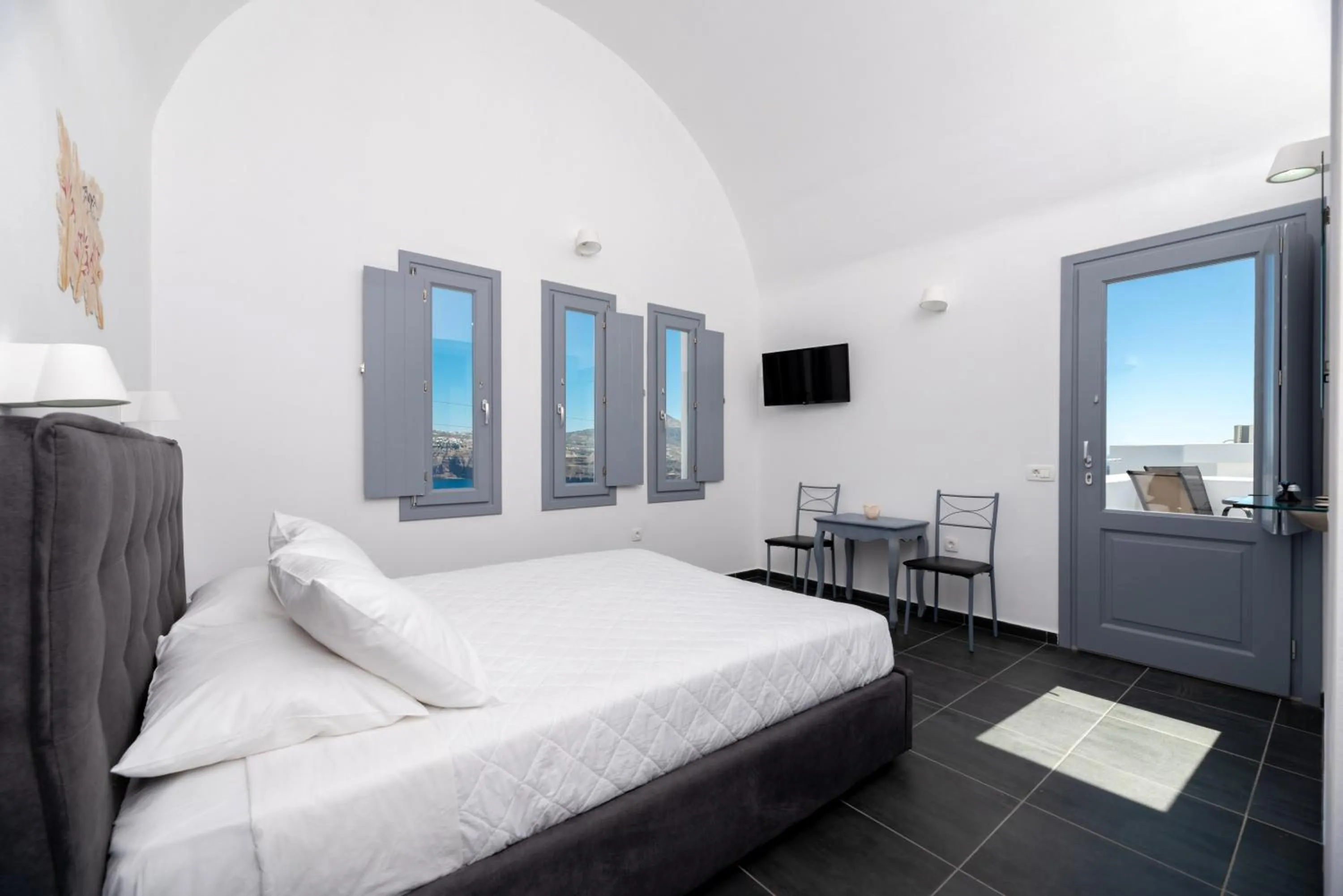 Bed in Pancratium Villas & Suites