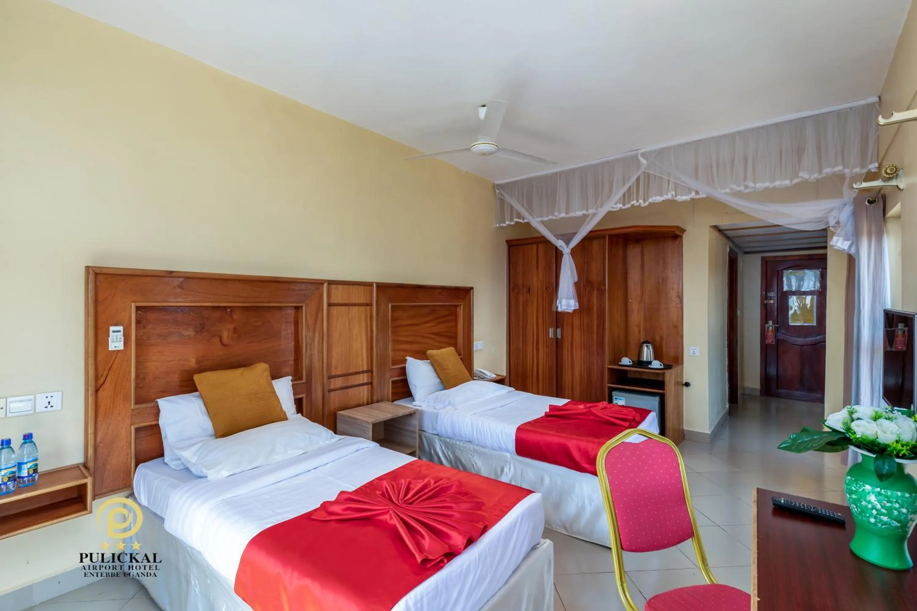 Bed in Pulickal Airport Hotel