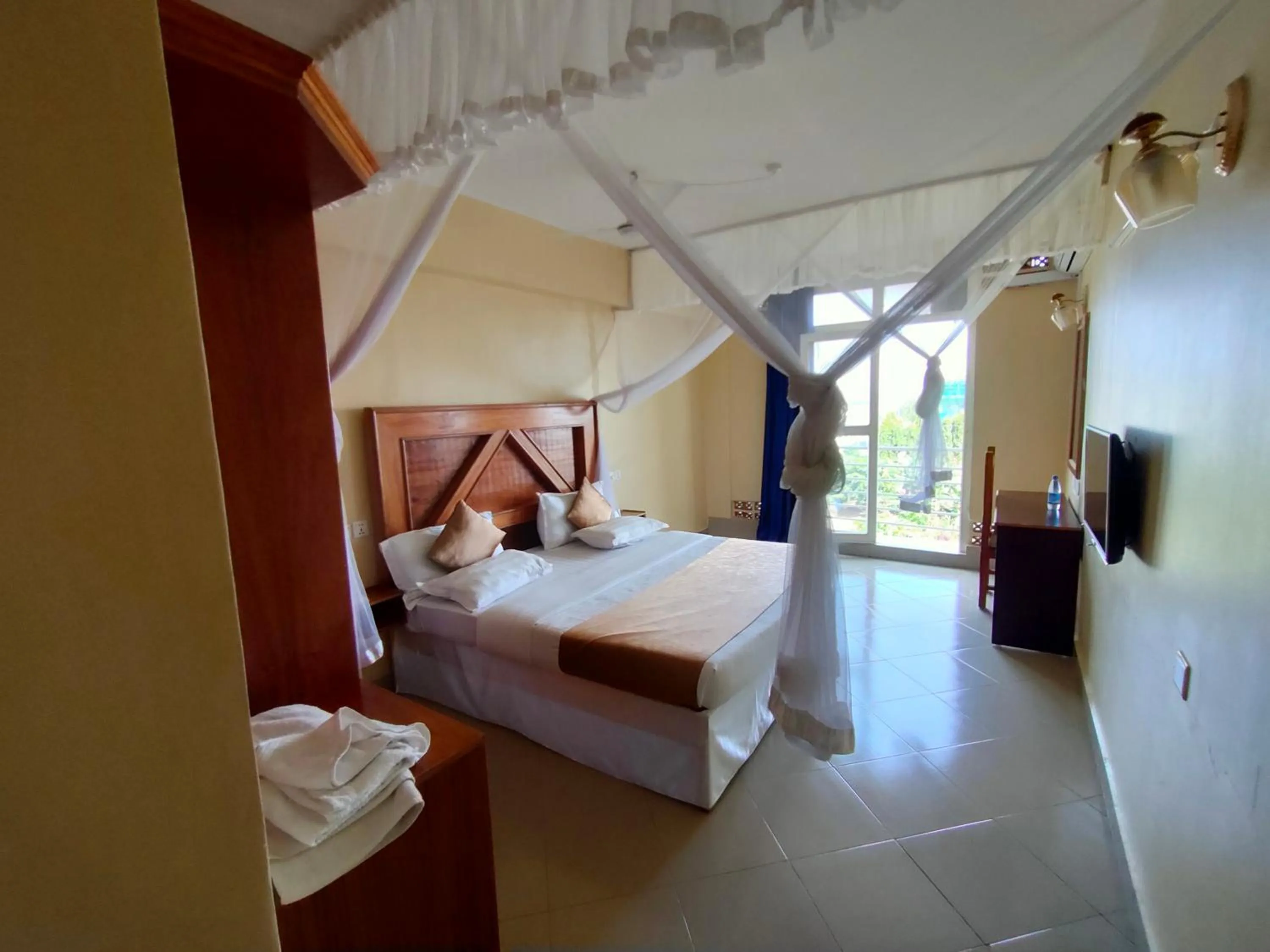 Bed in Pulickal Airport Hotel