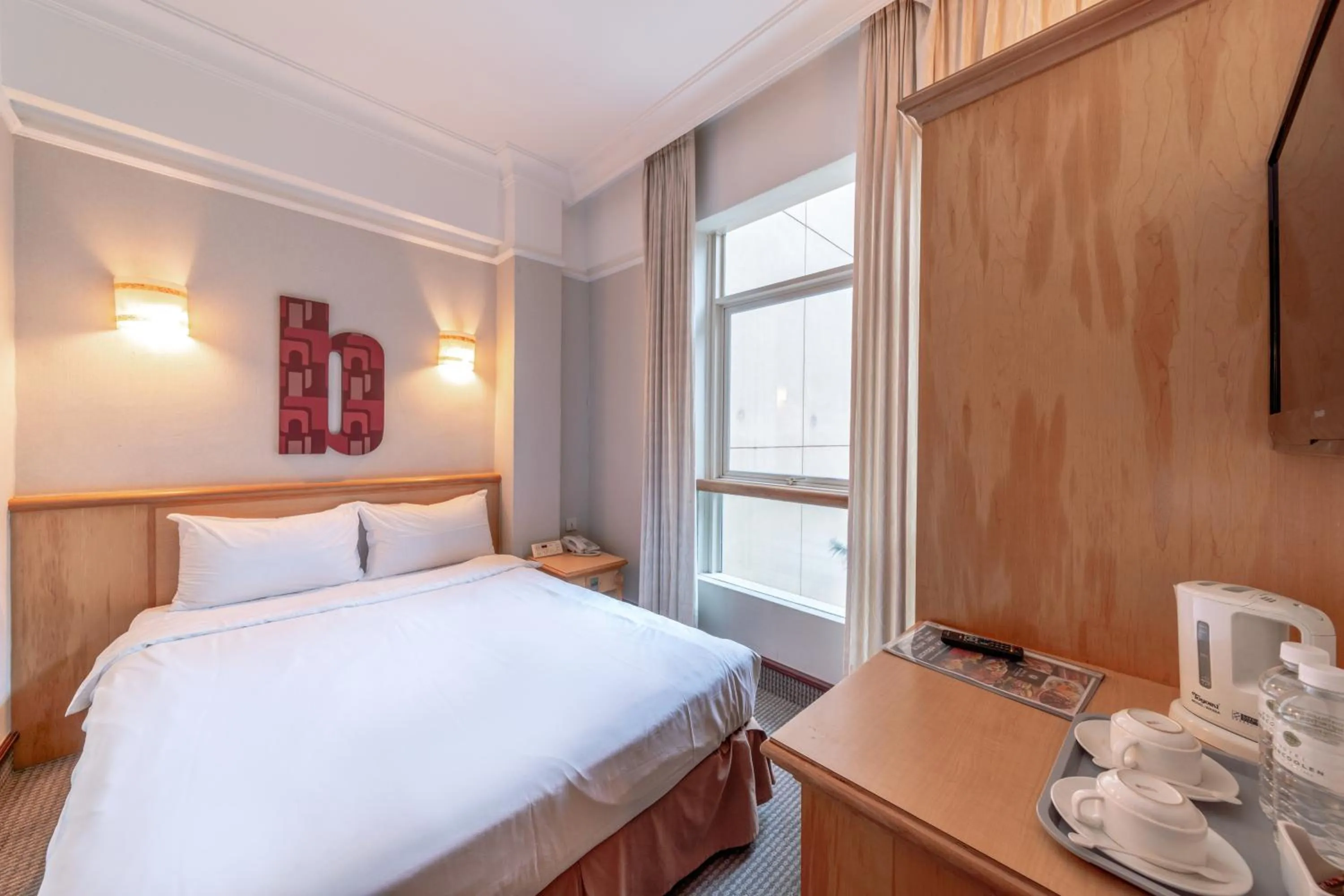 Bed in Hotel Bencoolen Singapore