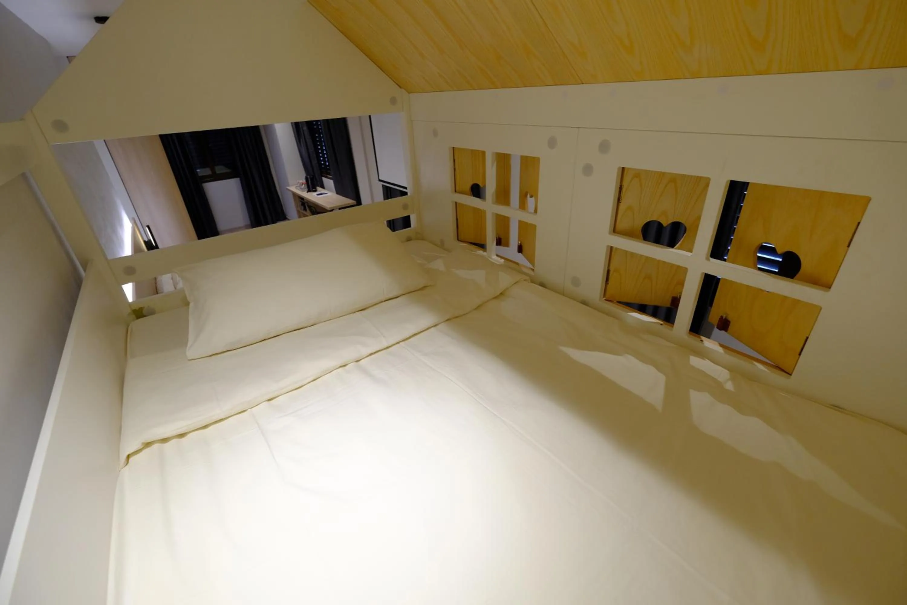 Bed in Rest Bugis Hotel