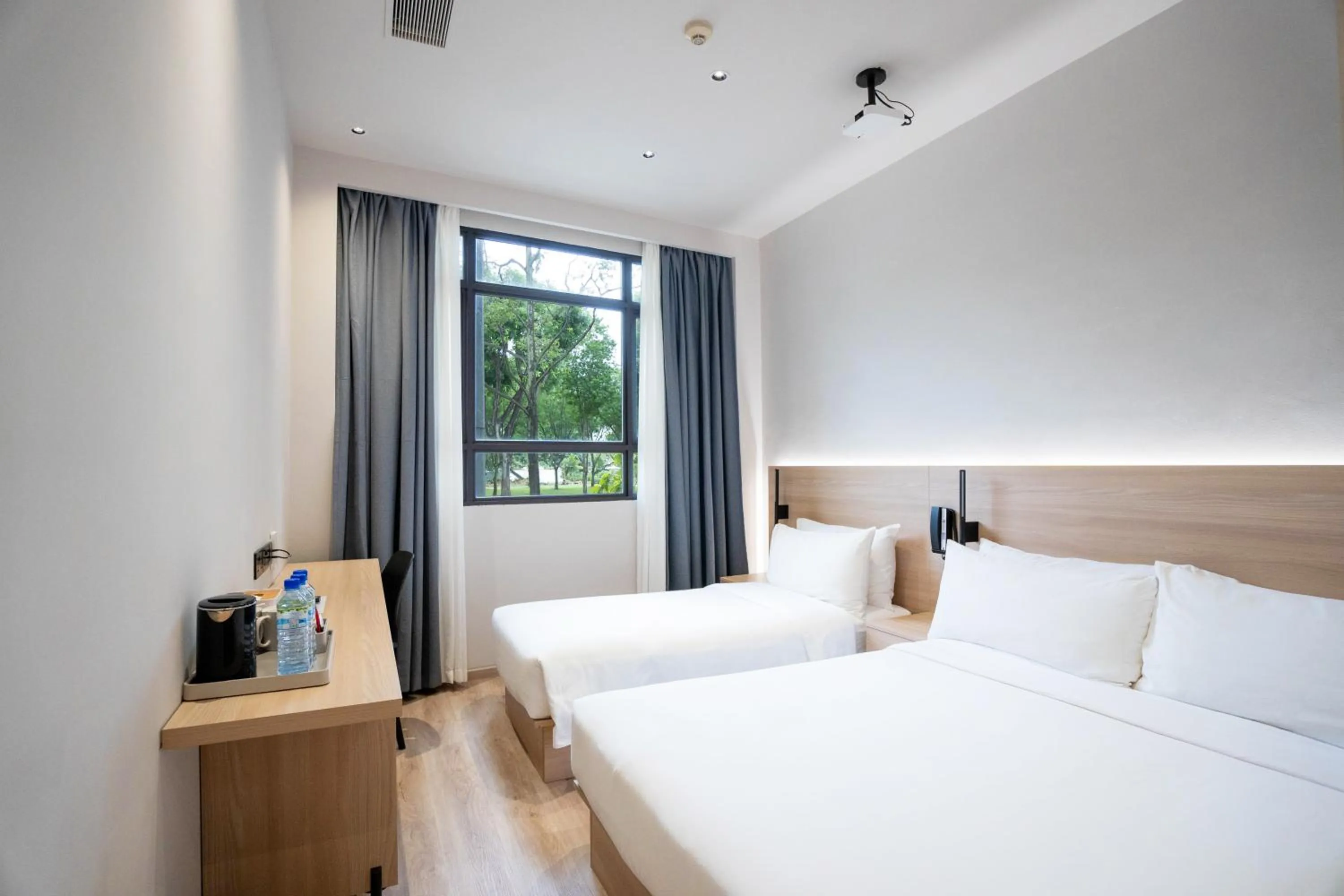 Bed in Rest Bugis Hotel