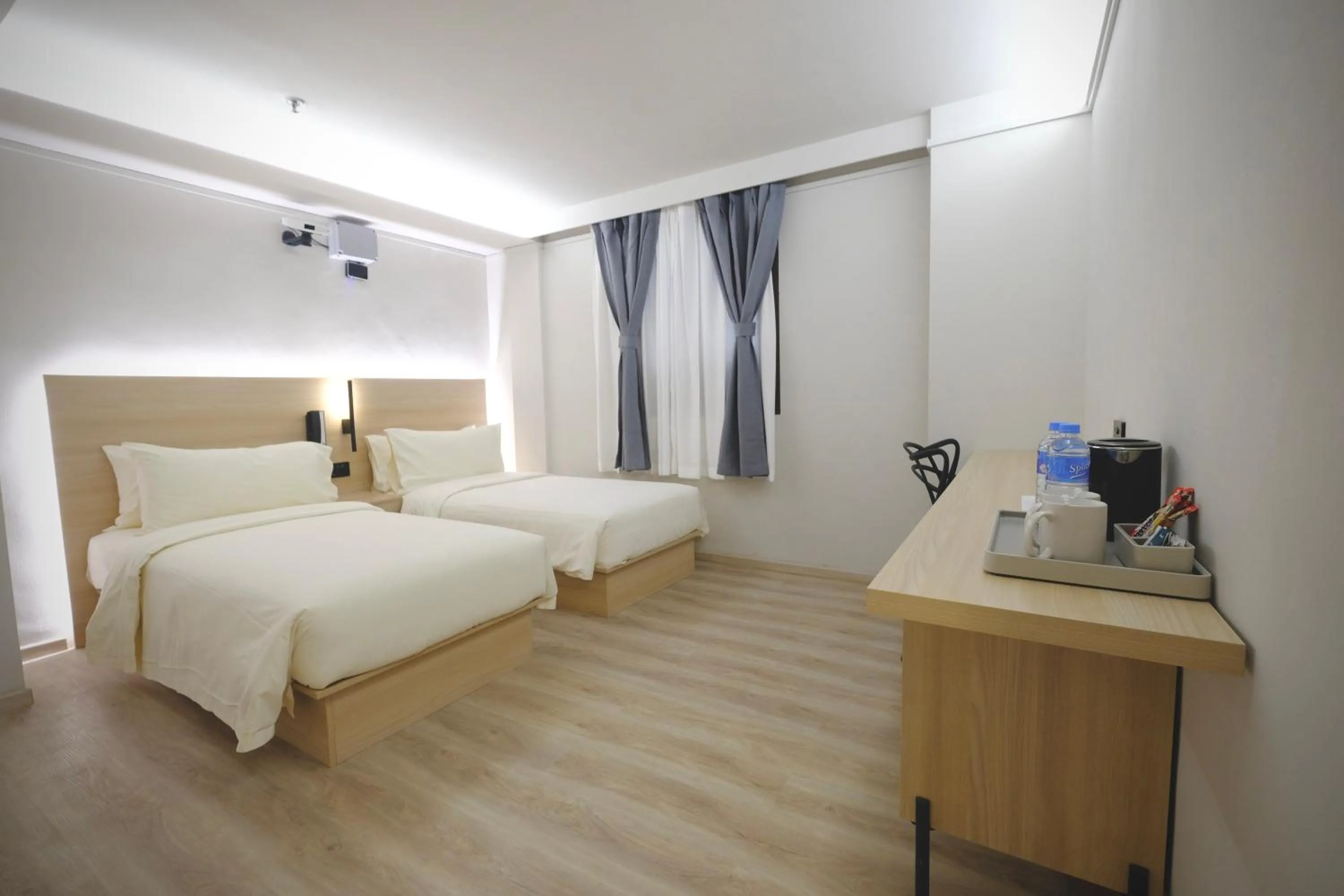 Bed in Rest Bugis Hotel