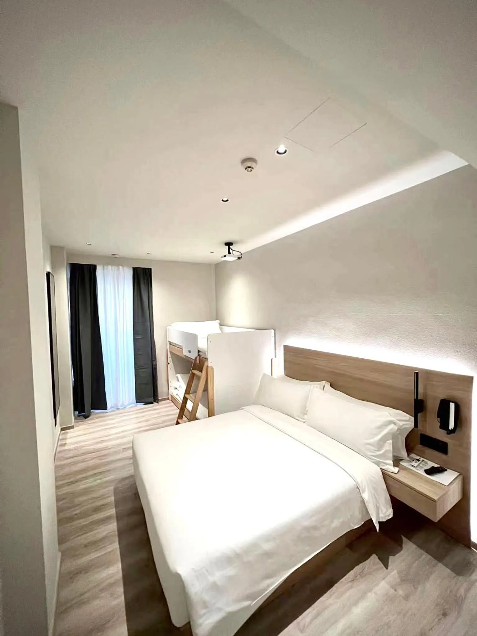 Bed in Rest Bugis Hotel