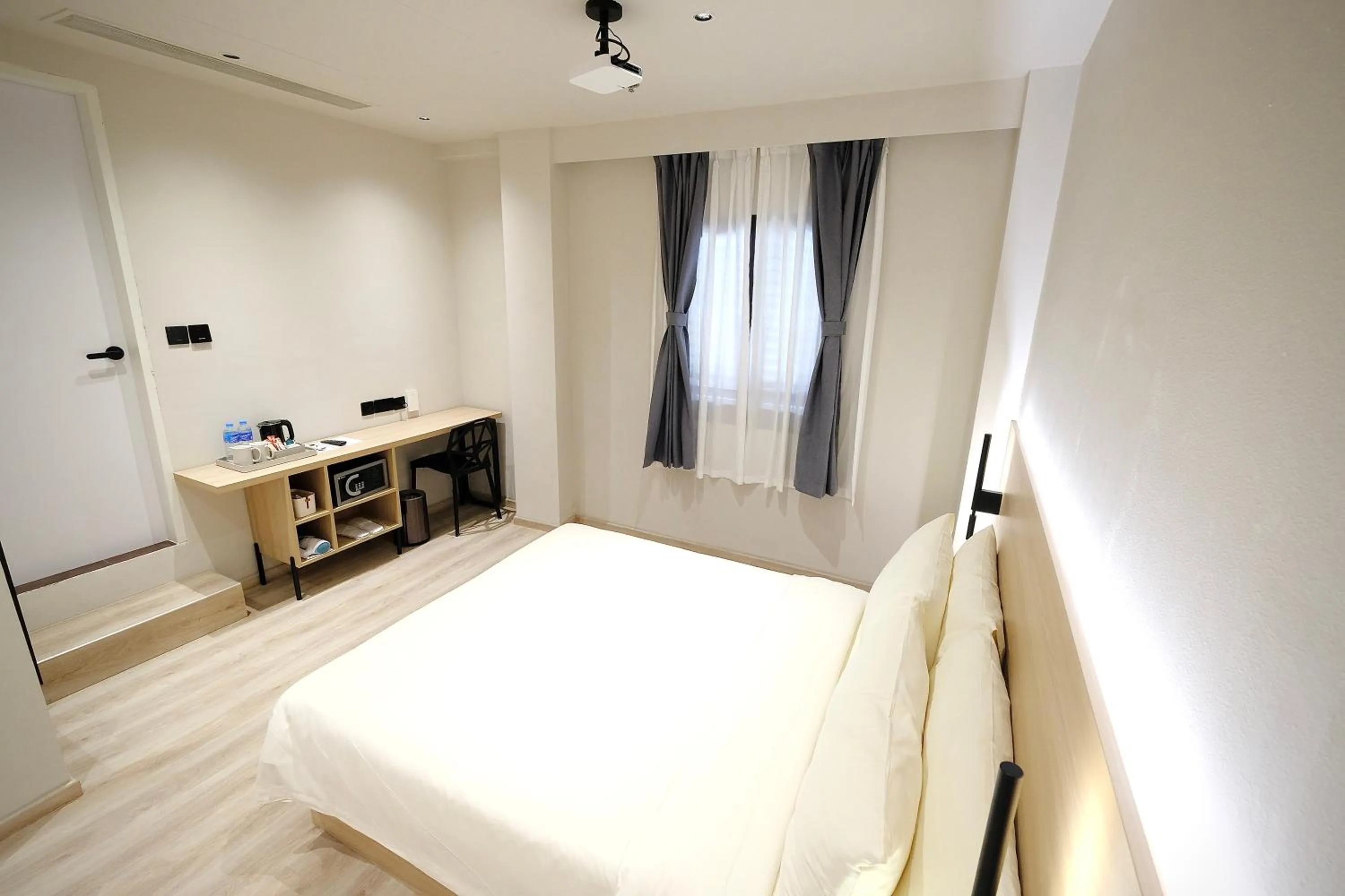 Bed in Rest Bugis Hotel