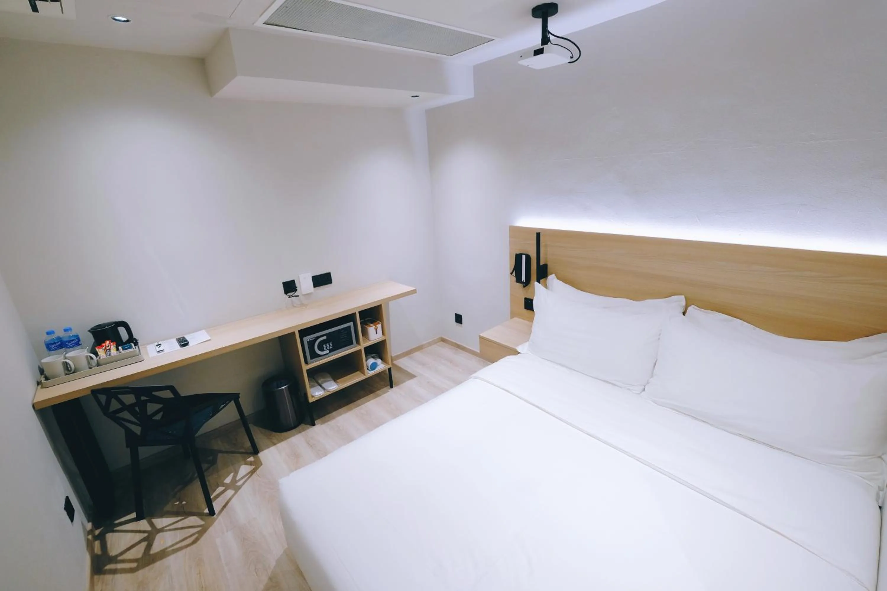 Bed in Rest Bugis Hotel