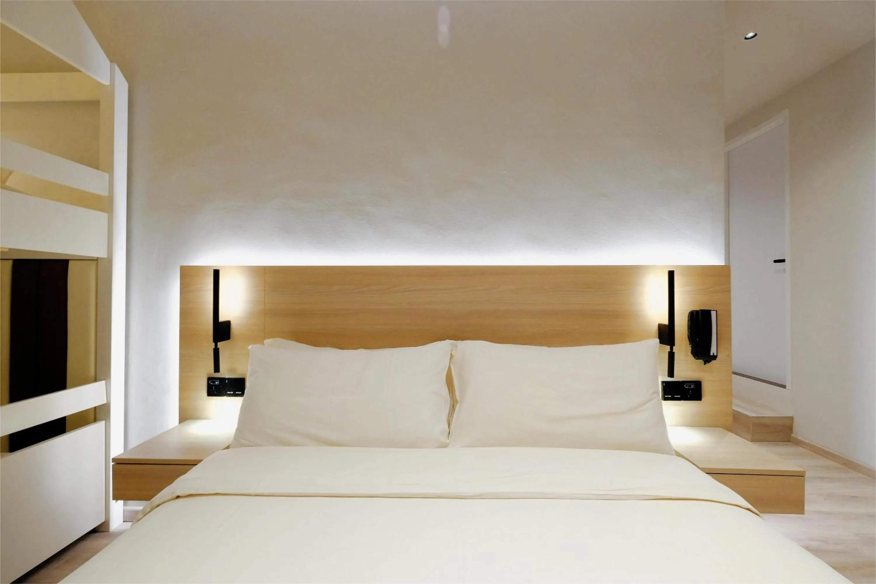 Bed in Rest Bugis Hotel