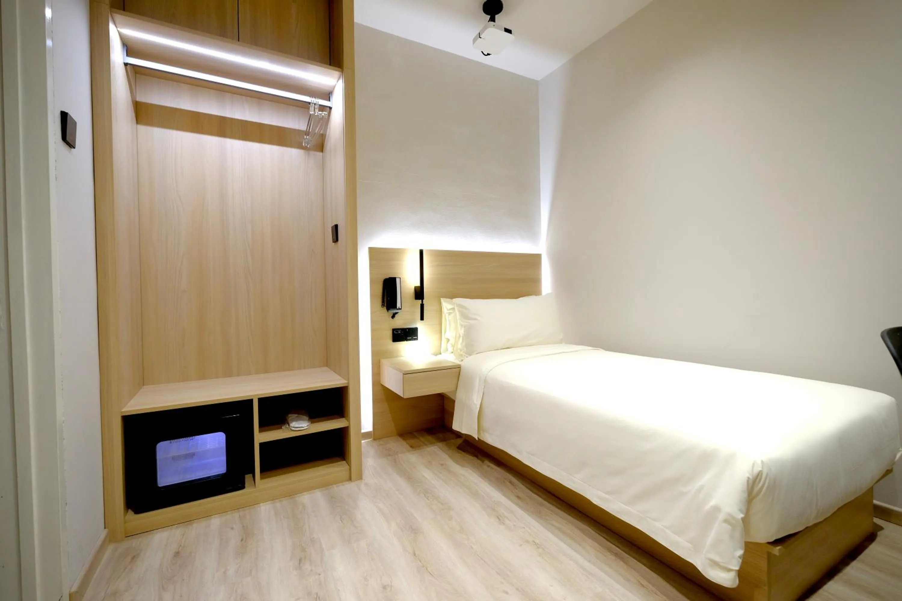 Bed in Rest Bugis Hotel