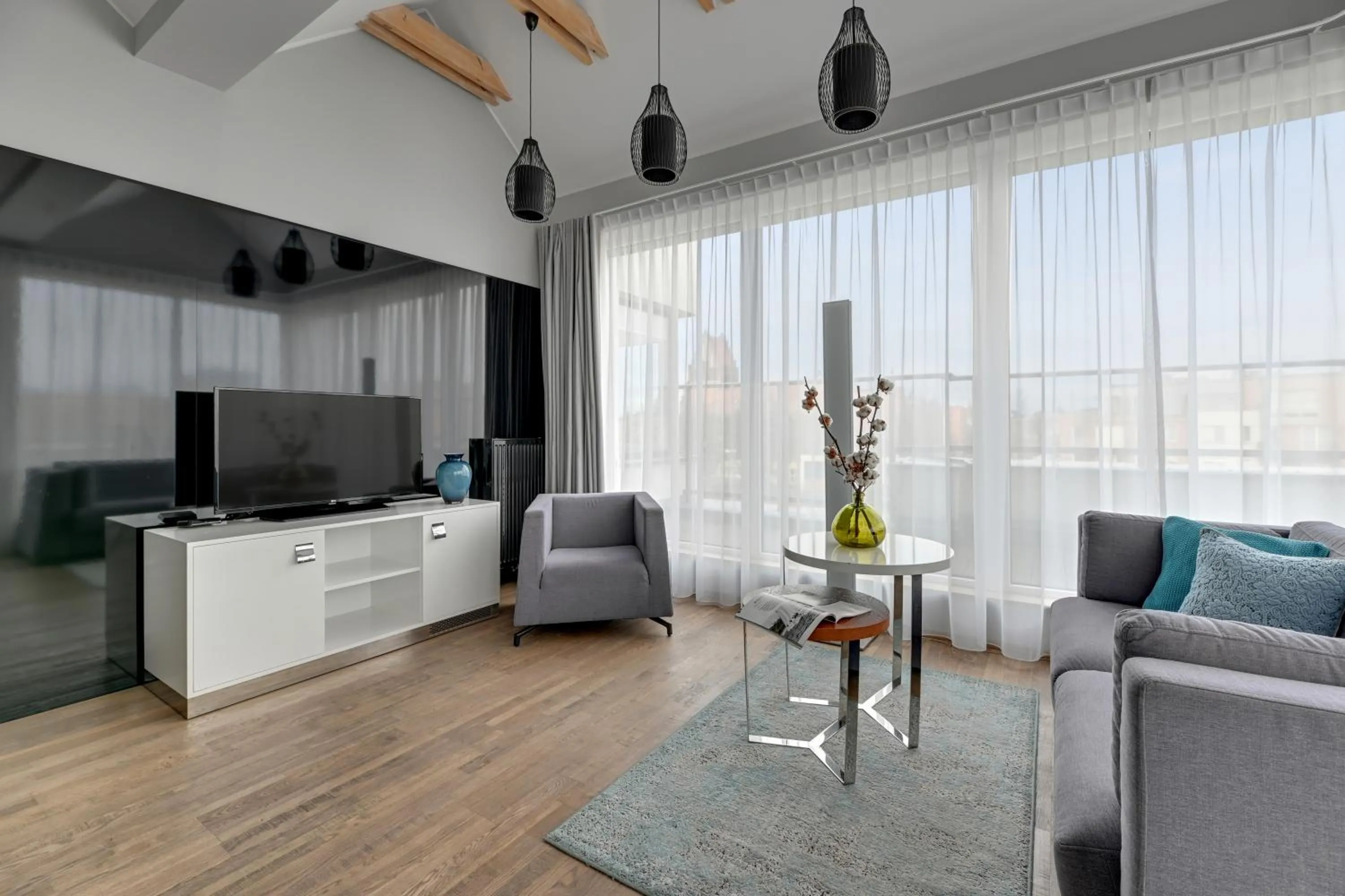 TV and multimedia in GRANO HOTEL Gdańsk Riverside dawniej HOTEL ALMOND BUSINESS & SPA