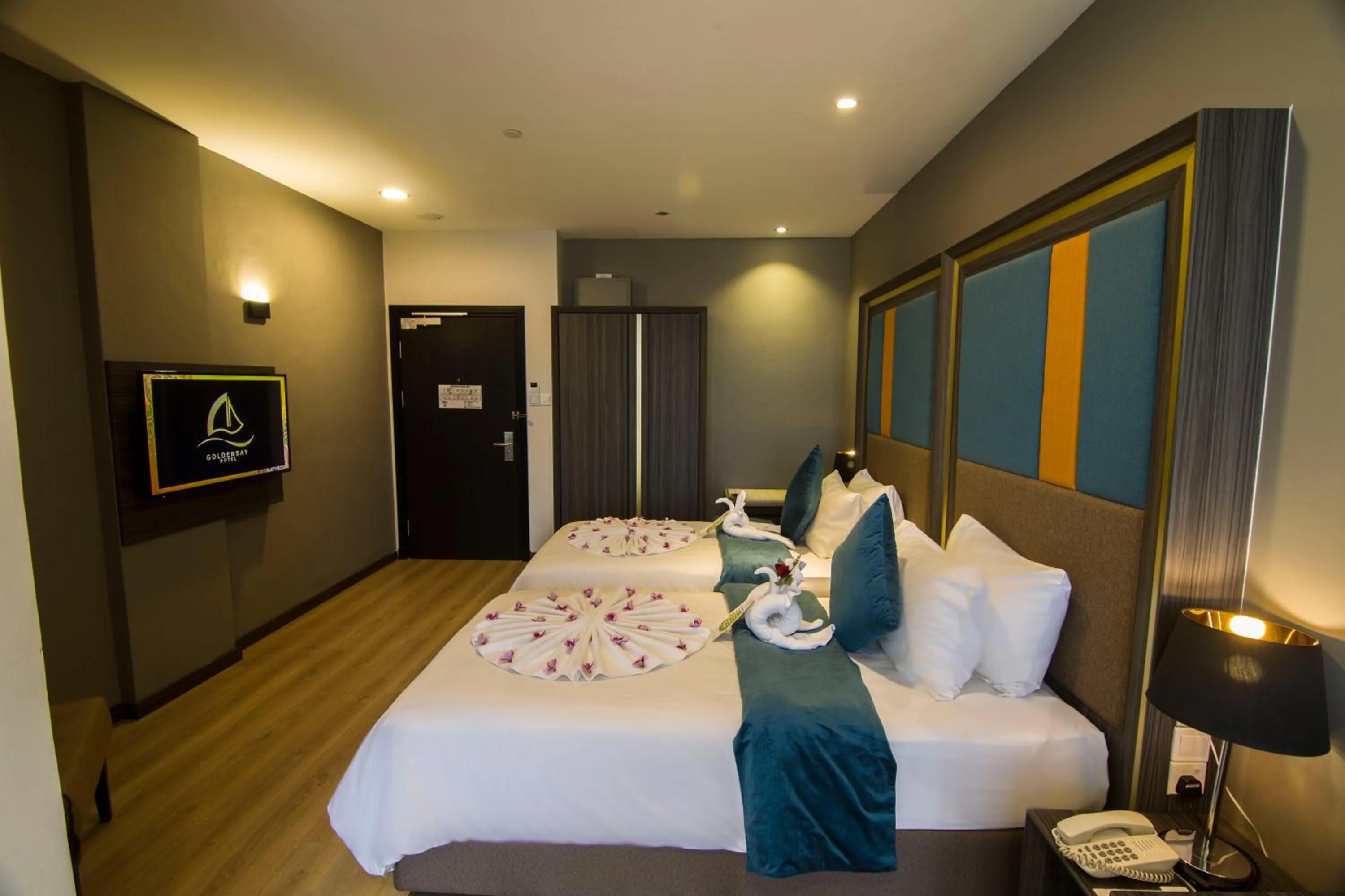 Bed in Goldenbay Hotel