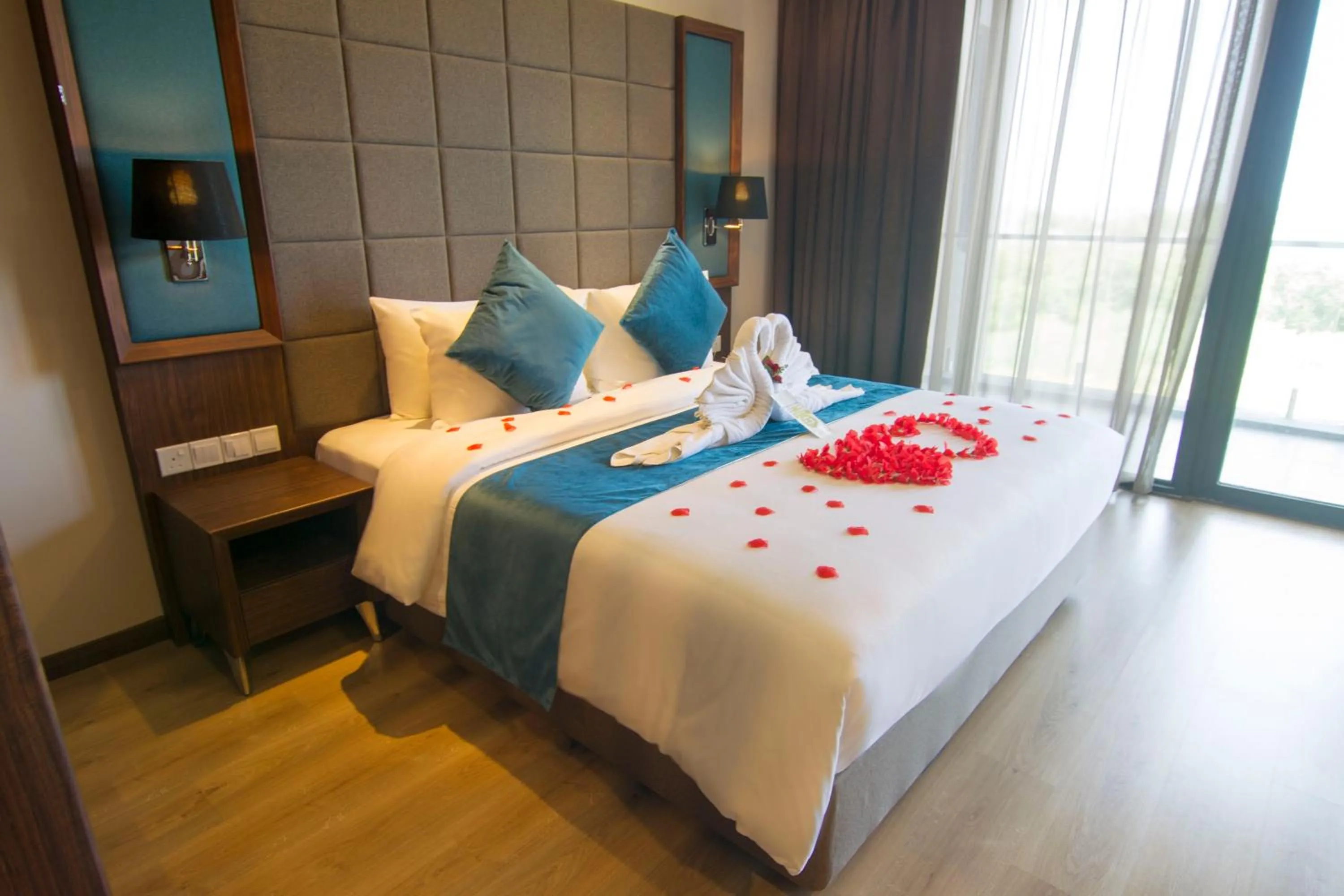 Bed in Goldenbay Hotel