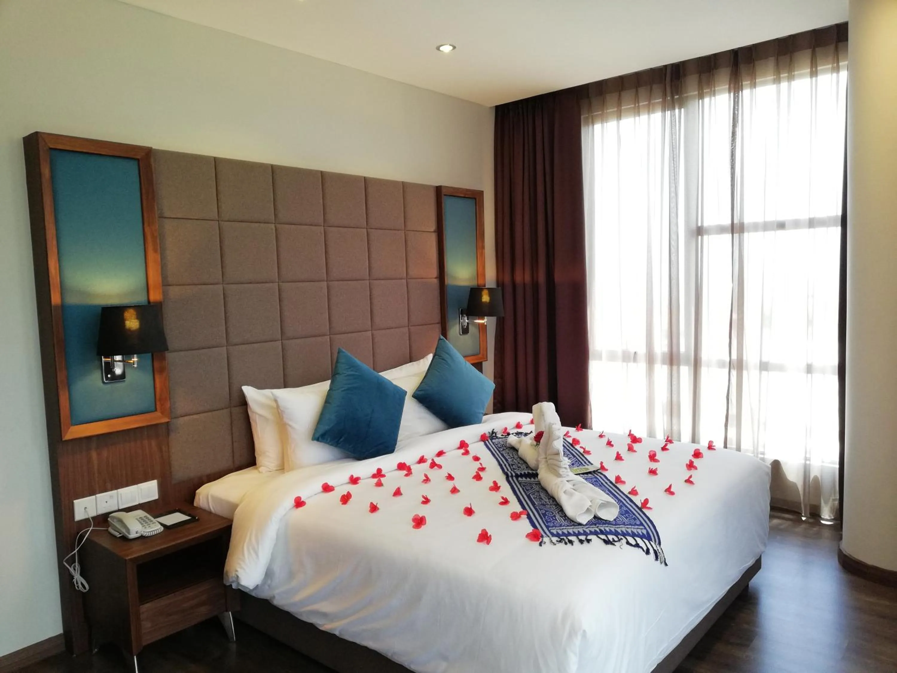 Bed in Goldenbay Hotel