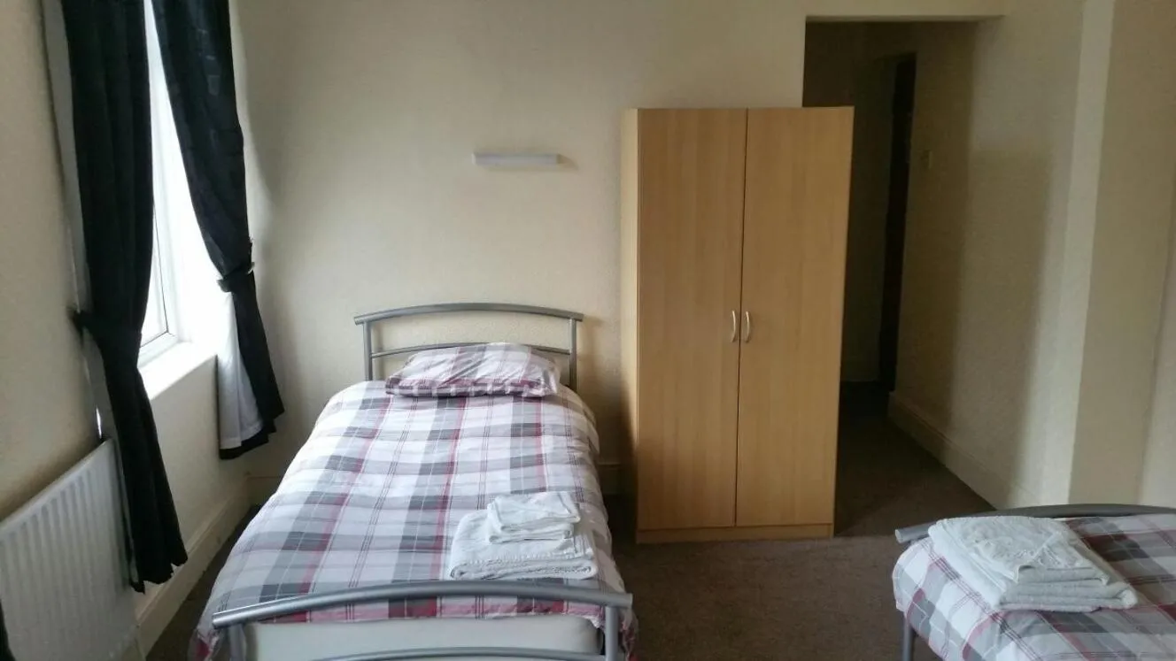 Bed in The Lodge Guest Accommodation