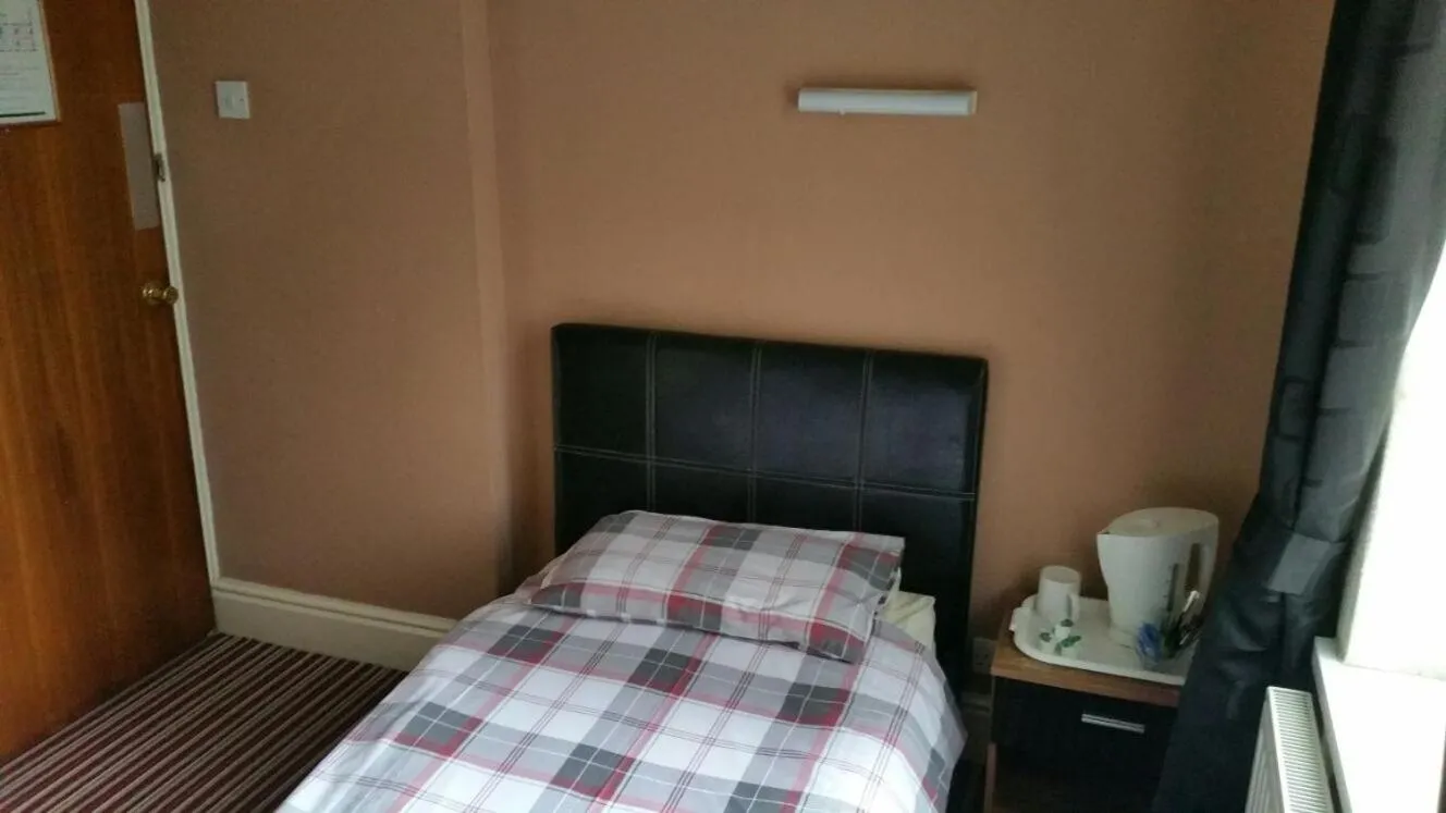 Bed in The Lodge Guest Accommodation