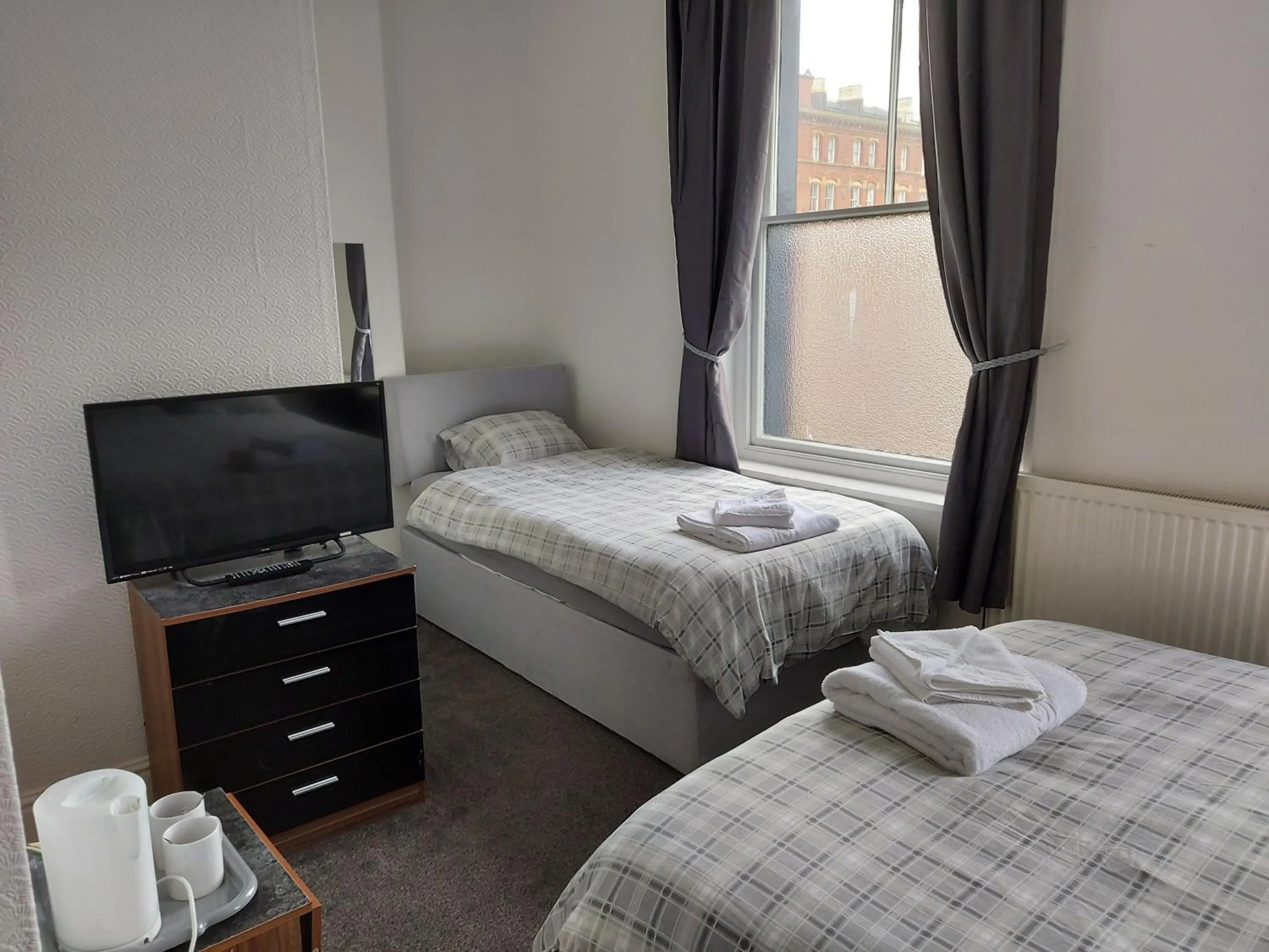 Bed in The Lodge Guest Accommodation