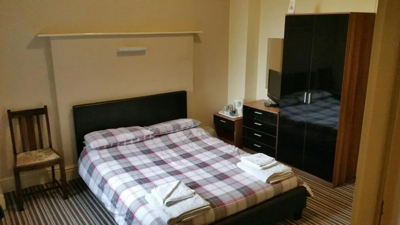 Bed in The Lodge Guest Accommodation