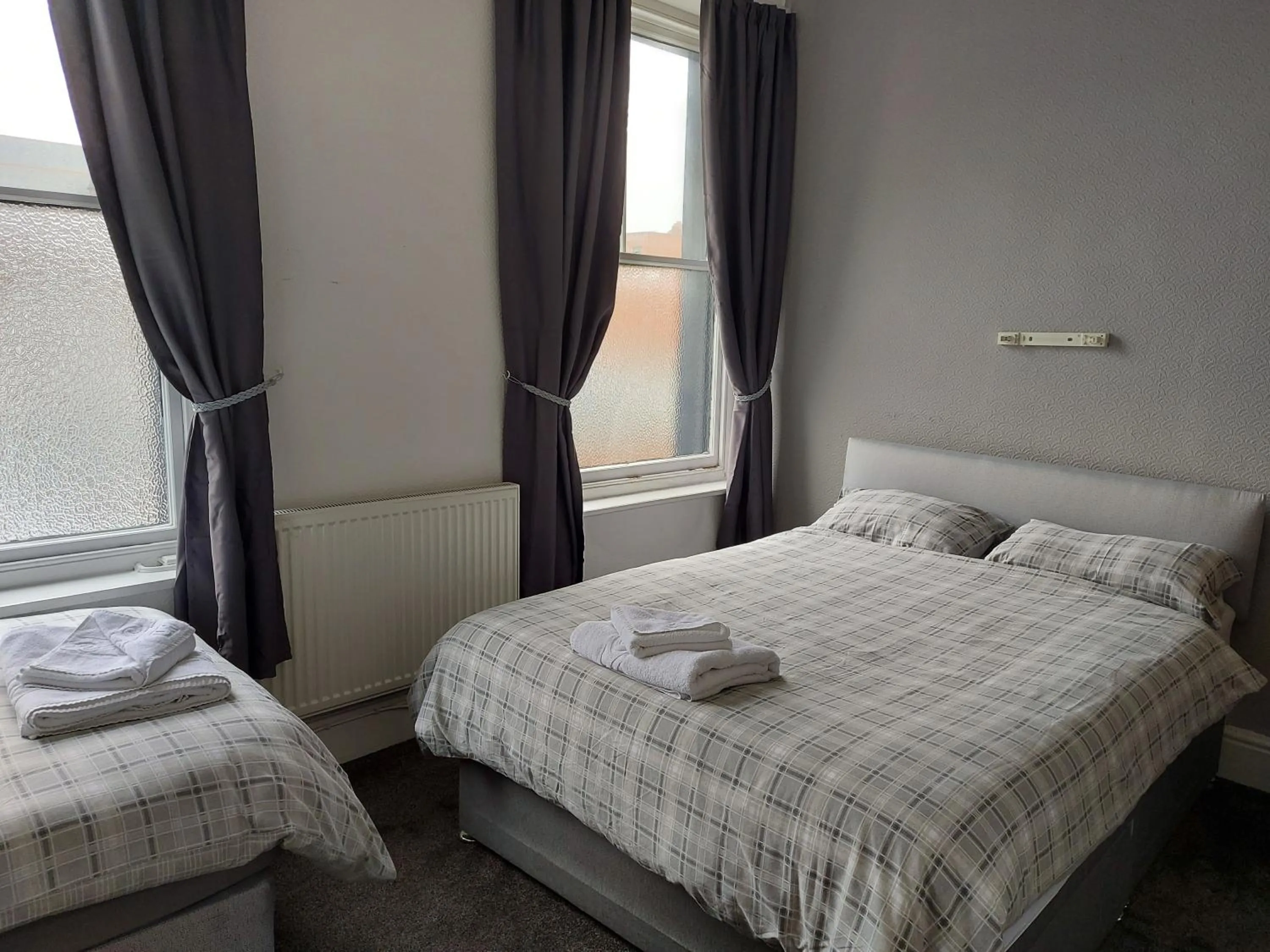 Bed in The Lodge Guest Accommodation