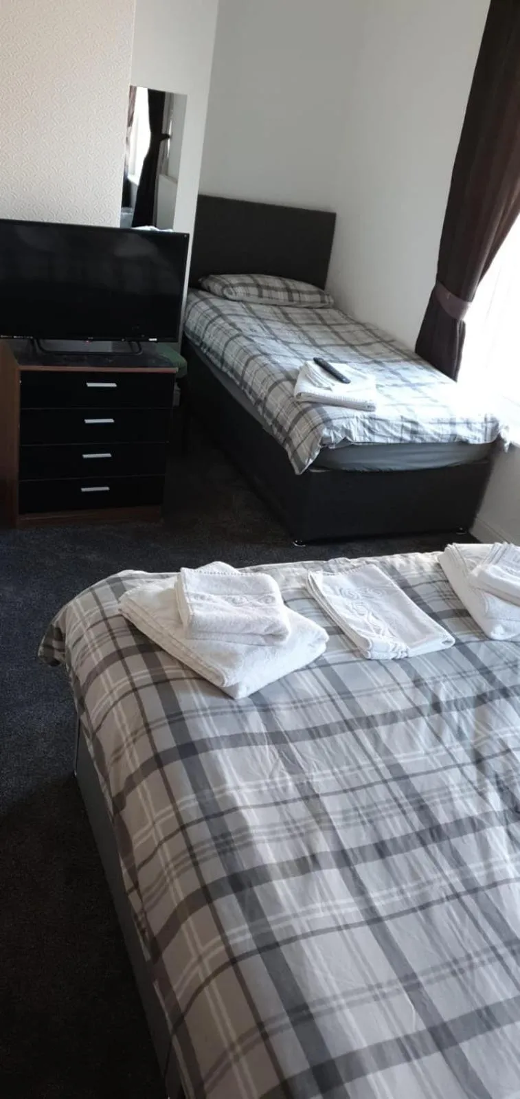 Bed in The Lodge Guest Accommodation