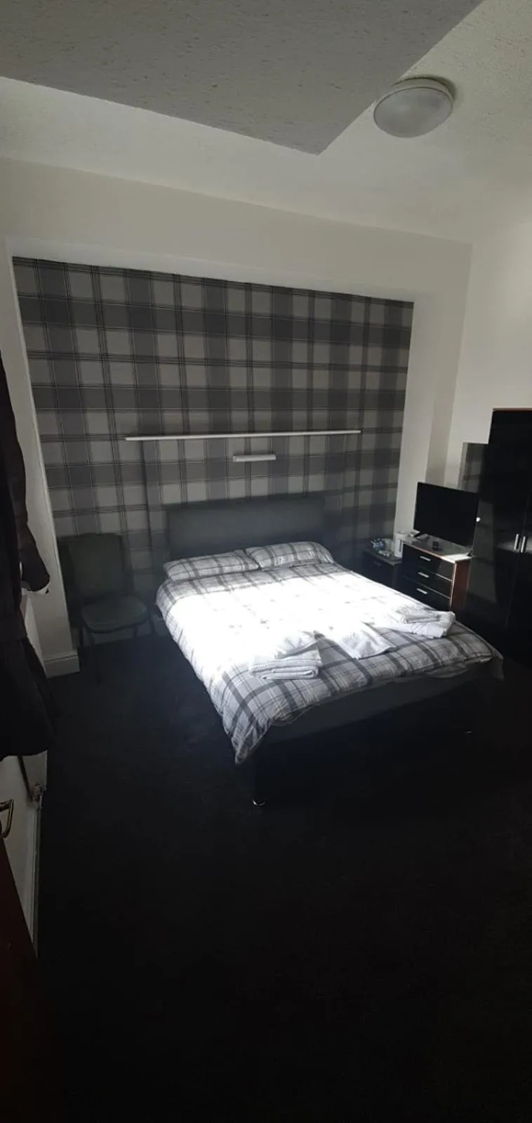 Bed in The Lodge Guest Accommodation