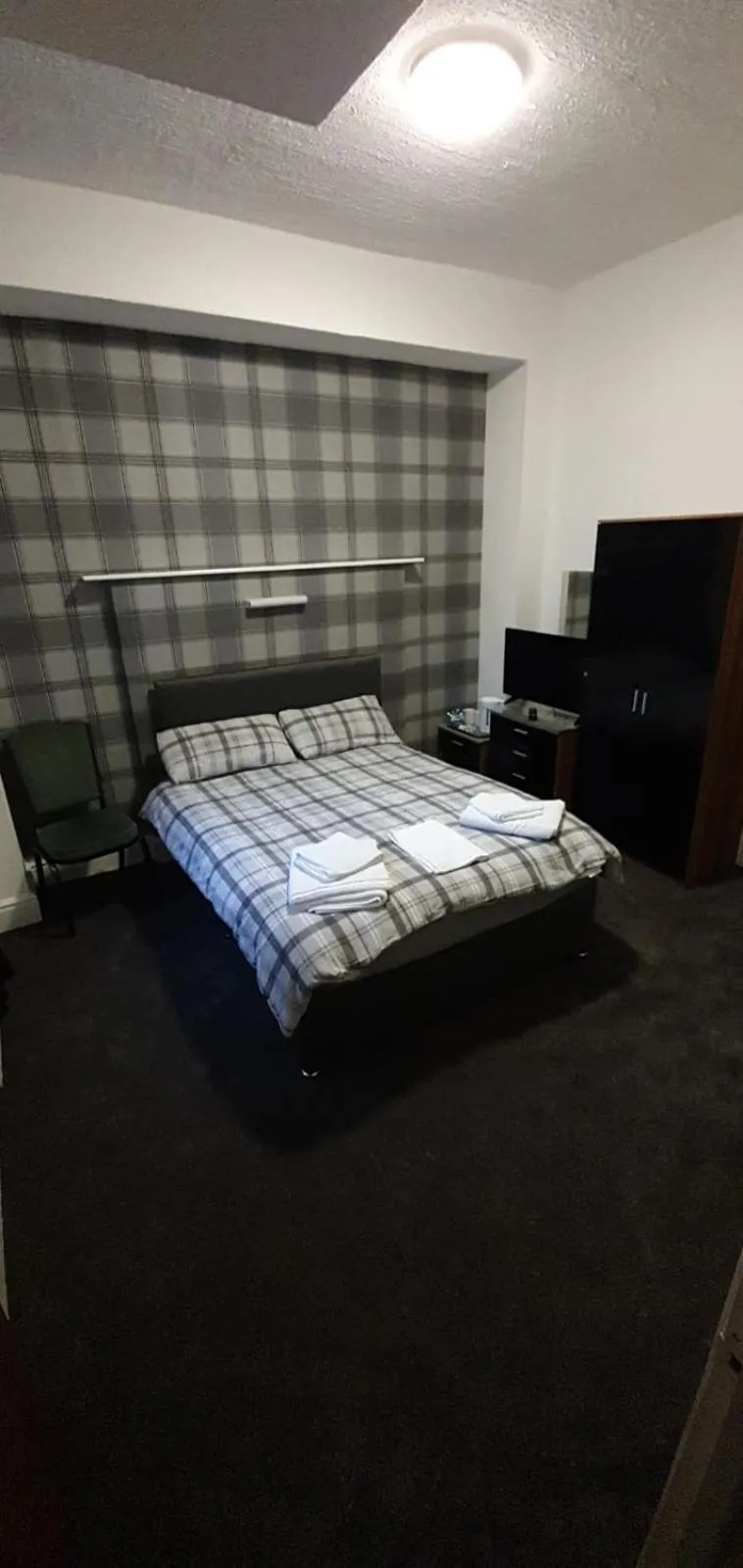 Bed in The Lodge Guest Accommodation