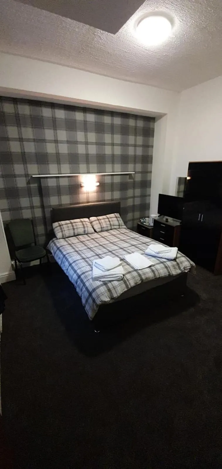 Bed in The Lodge Guest Accommodation