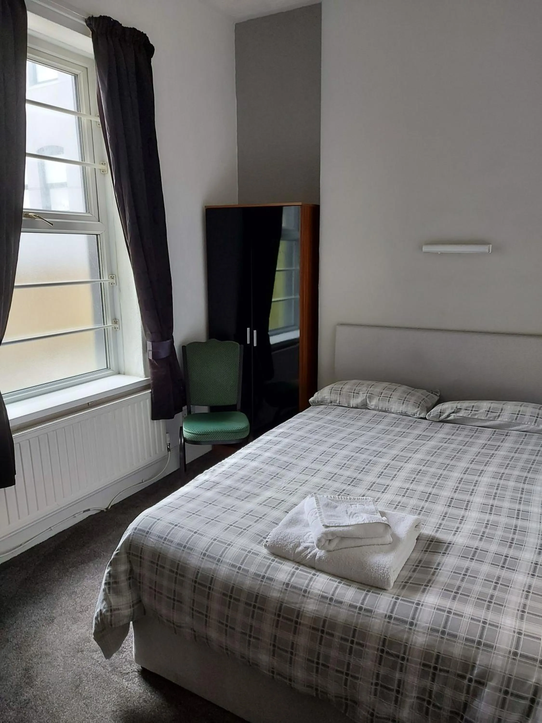 Bed in The Lodge Guest Accommodation