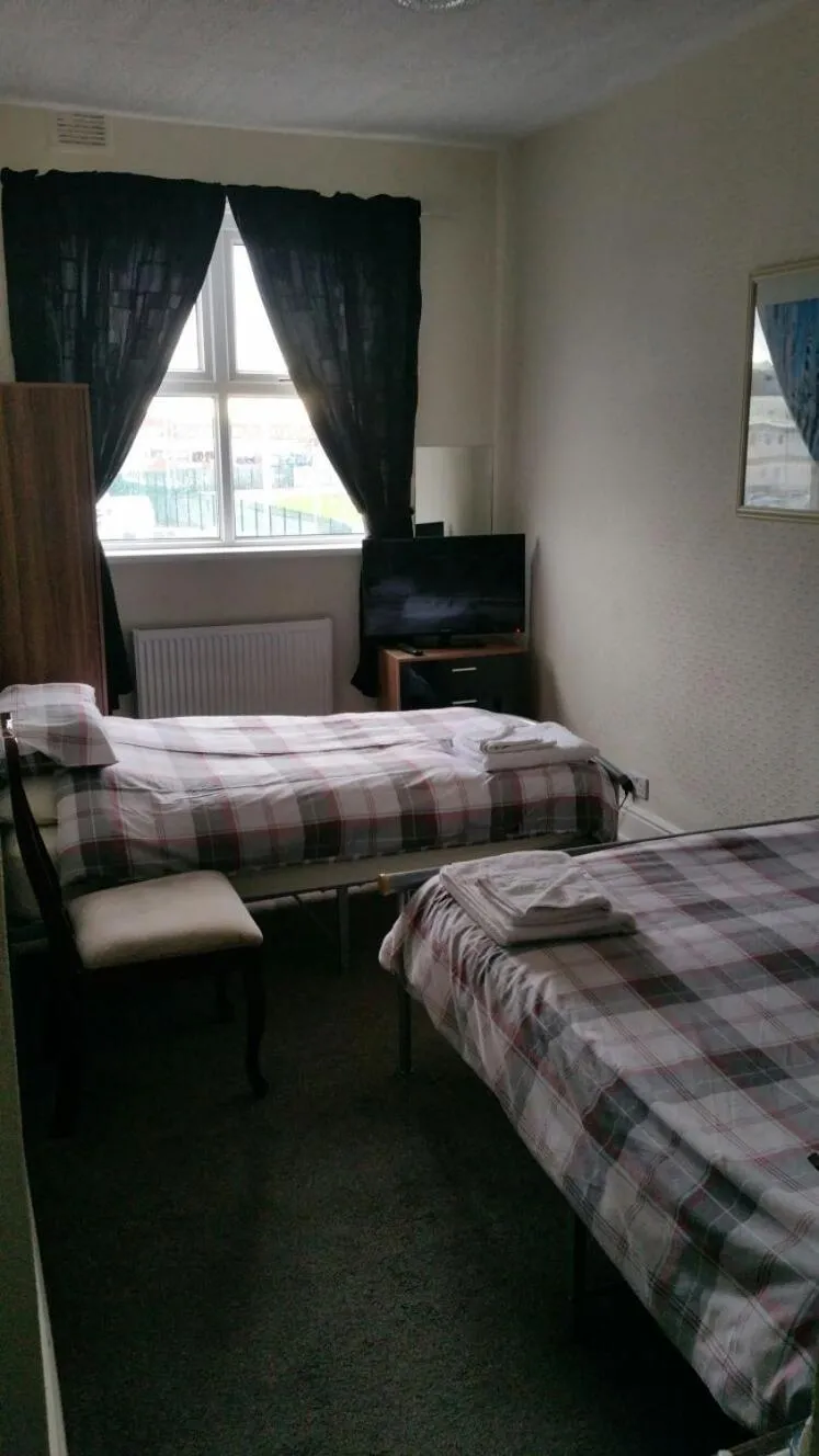 Bed in The Lodge Guest Accommodation