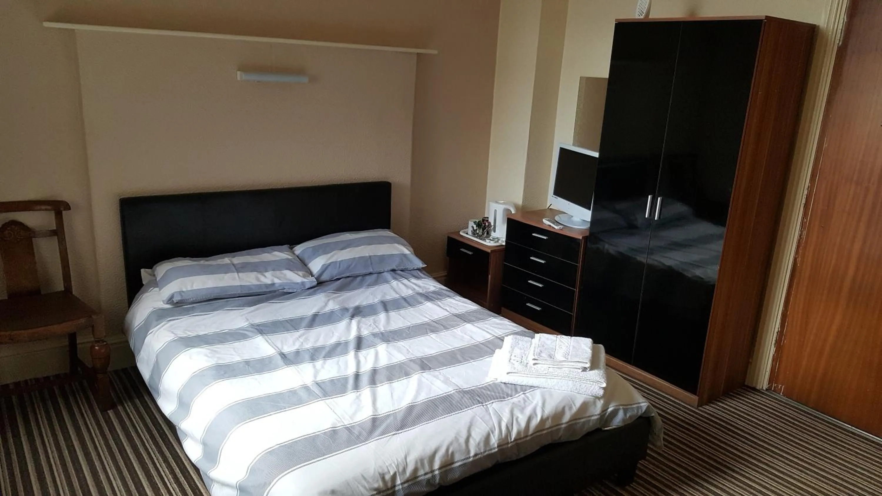 Bed in The Lodge Guest Accommodation