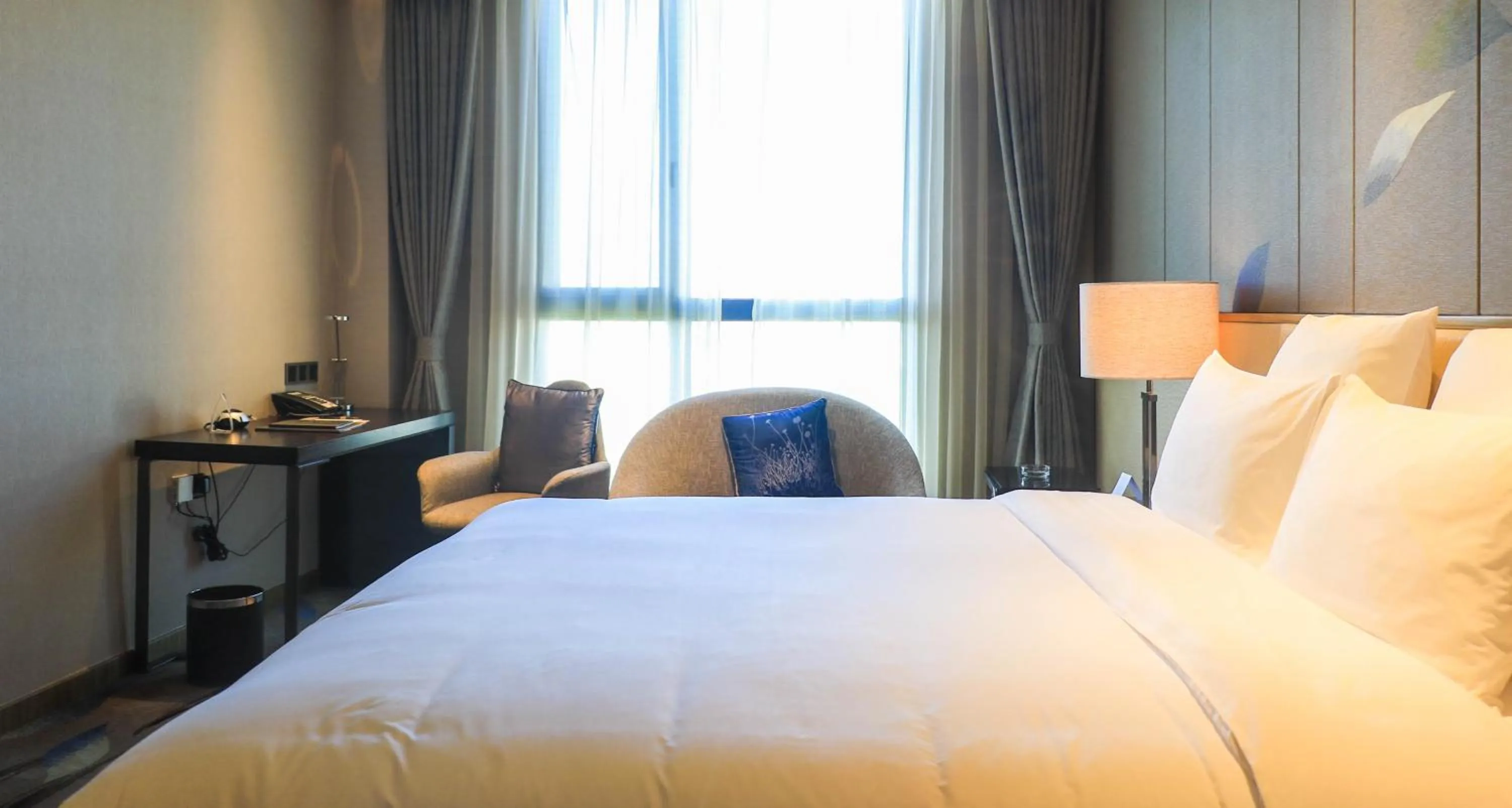 Bed in Pullman Nanchang Sunac