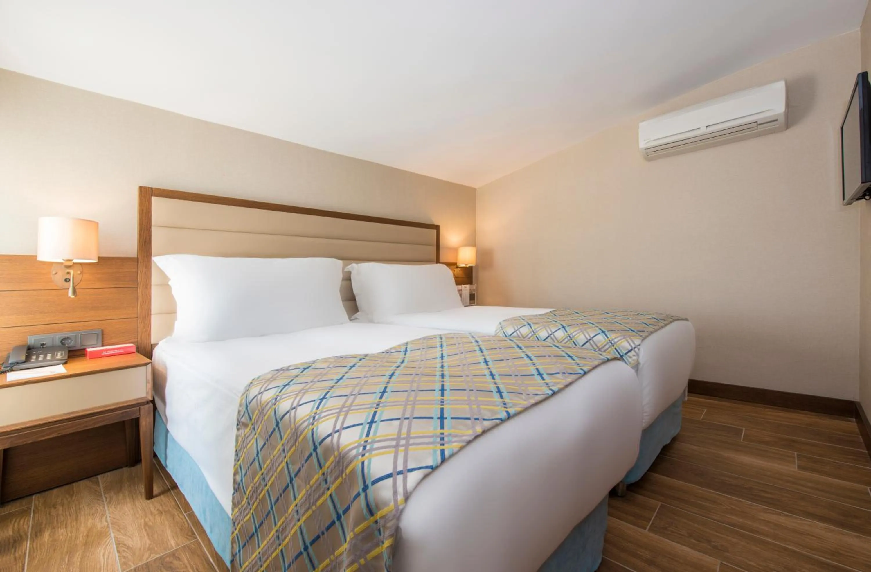 Bed in Ramada Plaza Antalya