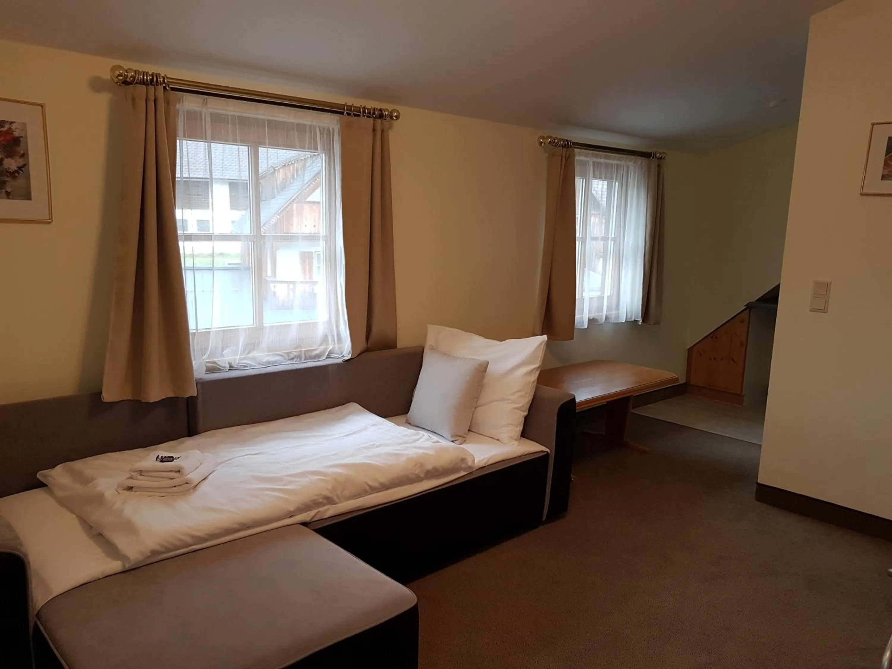 Living room, Bed in Hotel Tauplitzerhof