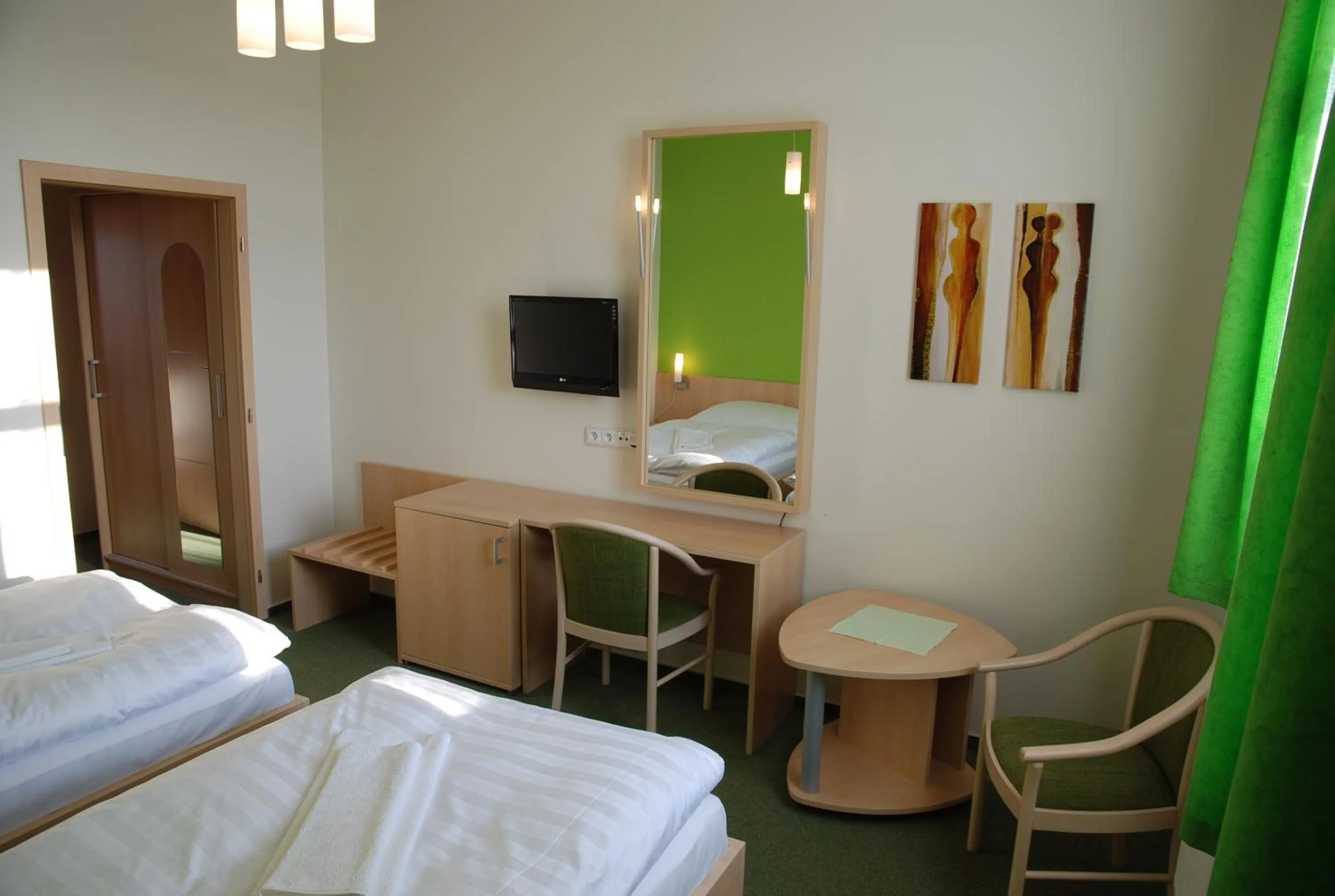 Seating area, Bed in Hotel Senimo