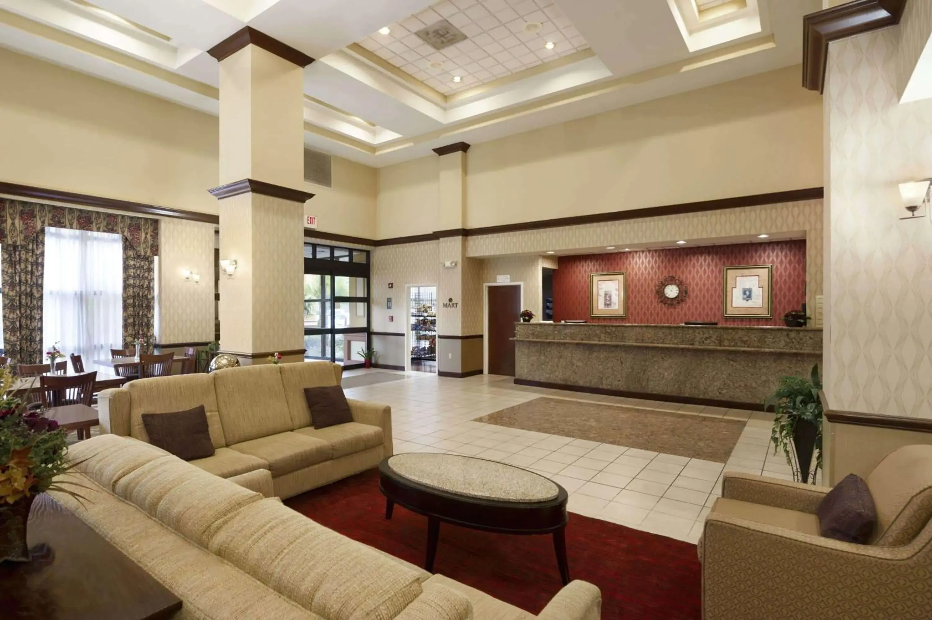 Lobby or reception in Ramada by Wyndham Suites Orlando Airport- Free Airport Shuttle Lobby or reception in Ramada by Wyndham Suites Orlando Airport- Free Airport Shuttle