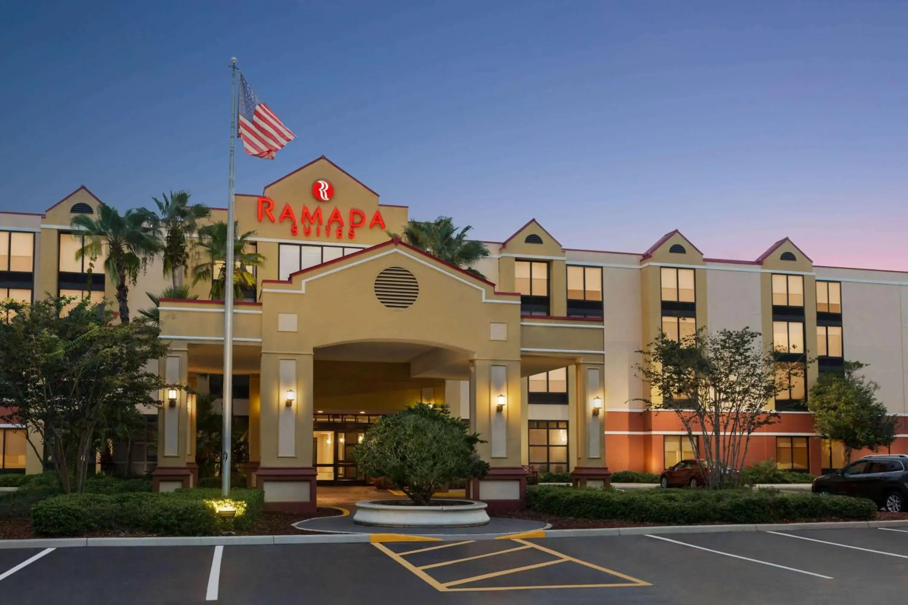 Property building in Ramada by Wyndham Suites Orlando Airport- Free Airport Shuttle Property building in Ramada by Wyndham Suites Orlando Airport- Free Airport Shuttle