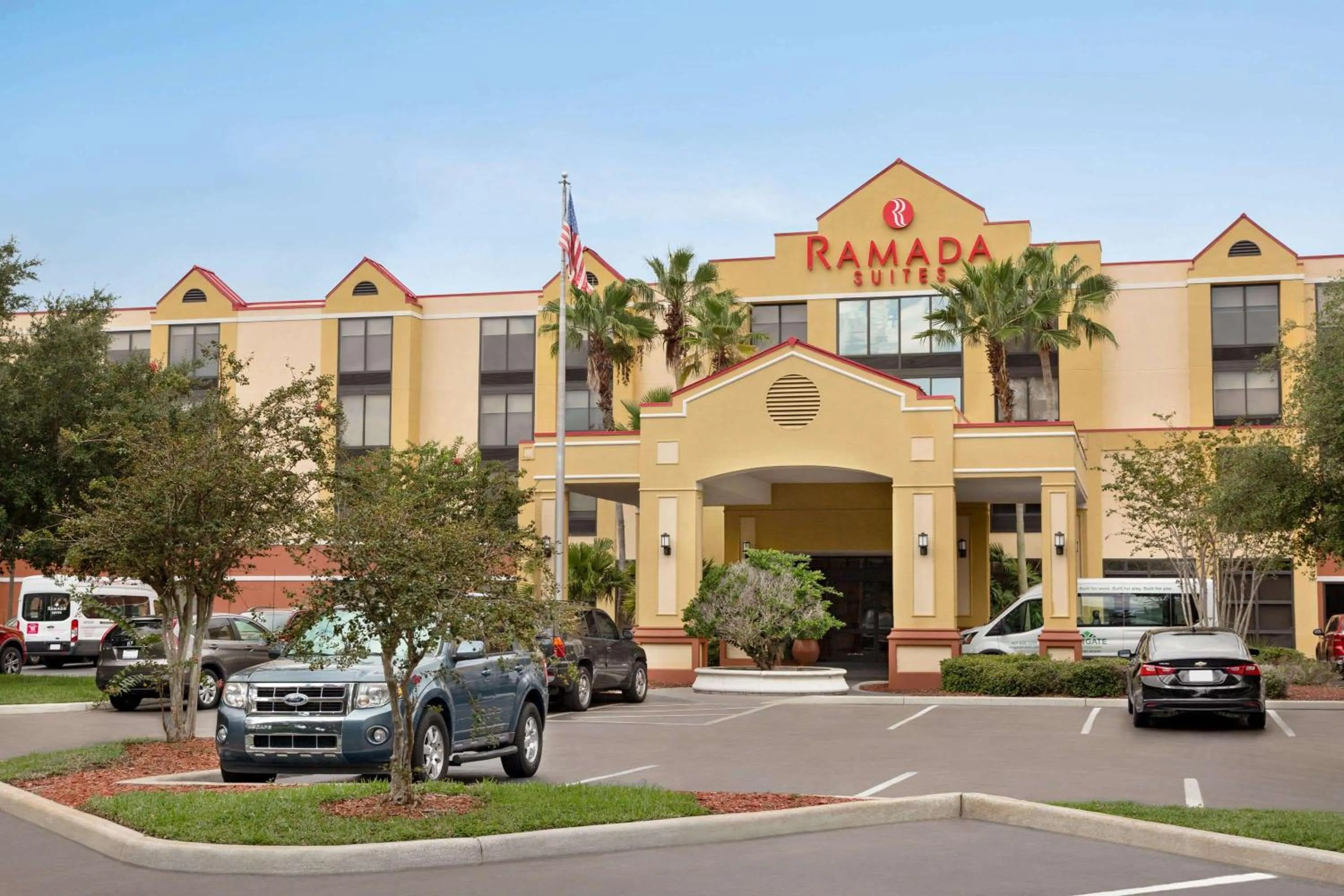 Property building in Ramada by Wyndham Suites Orlando Airport- Free Airport Shuttle